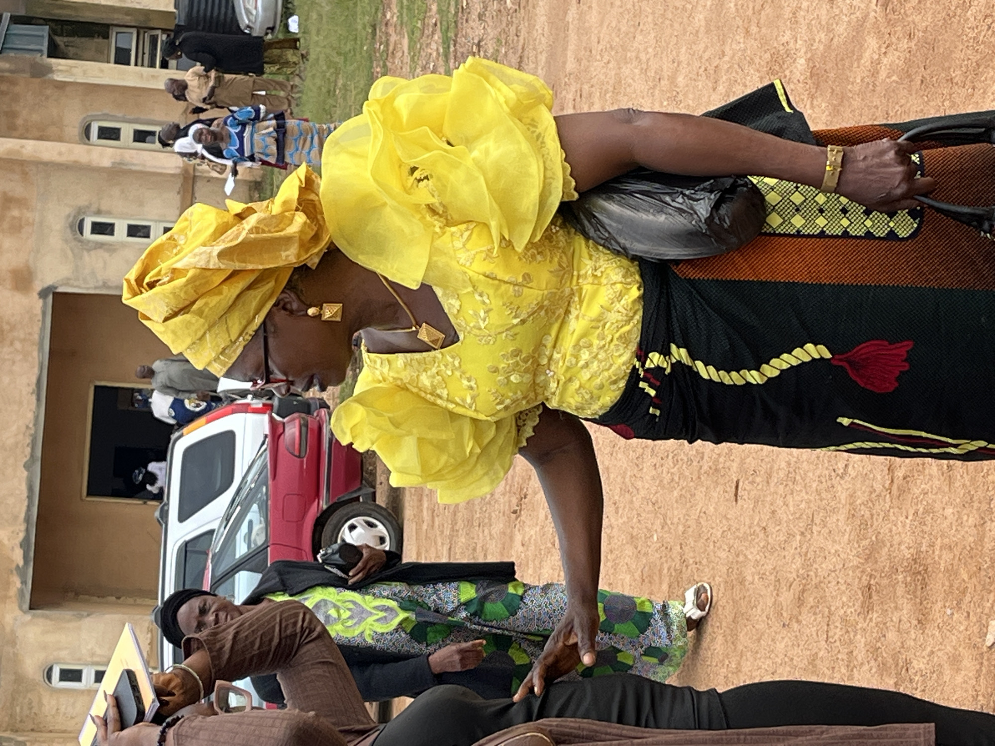 Community gathering outside a church in Jos, Nigeria