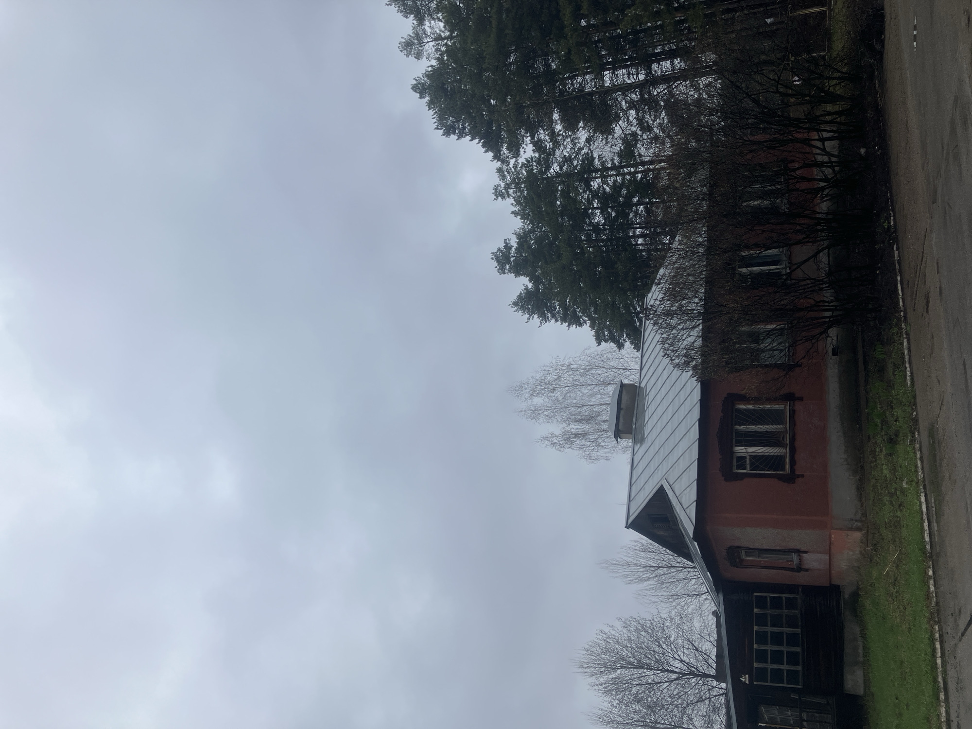 Old two-story house documented in Noviy, Russia