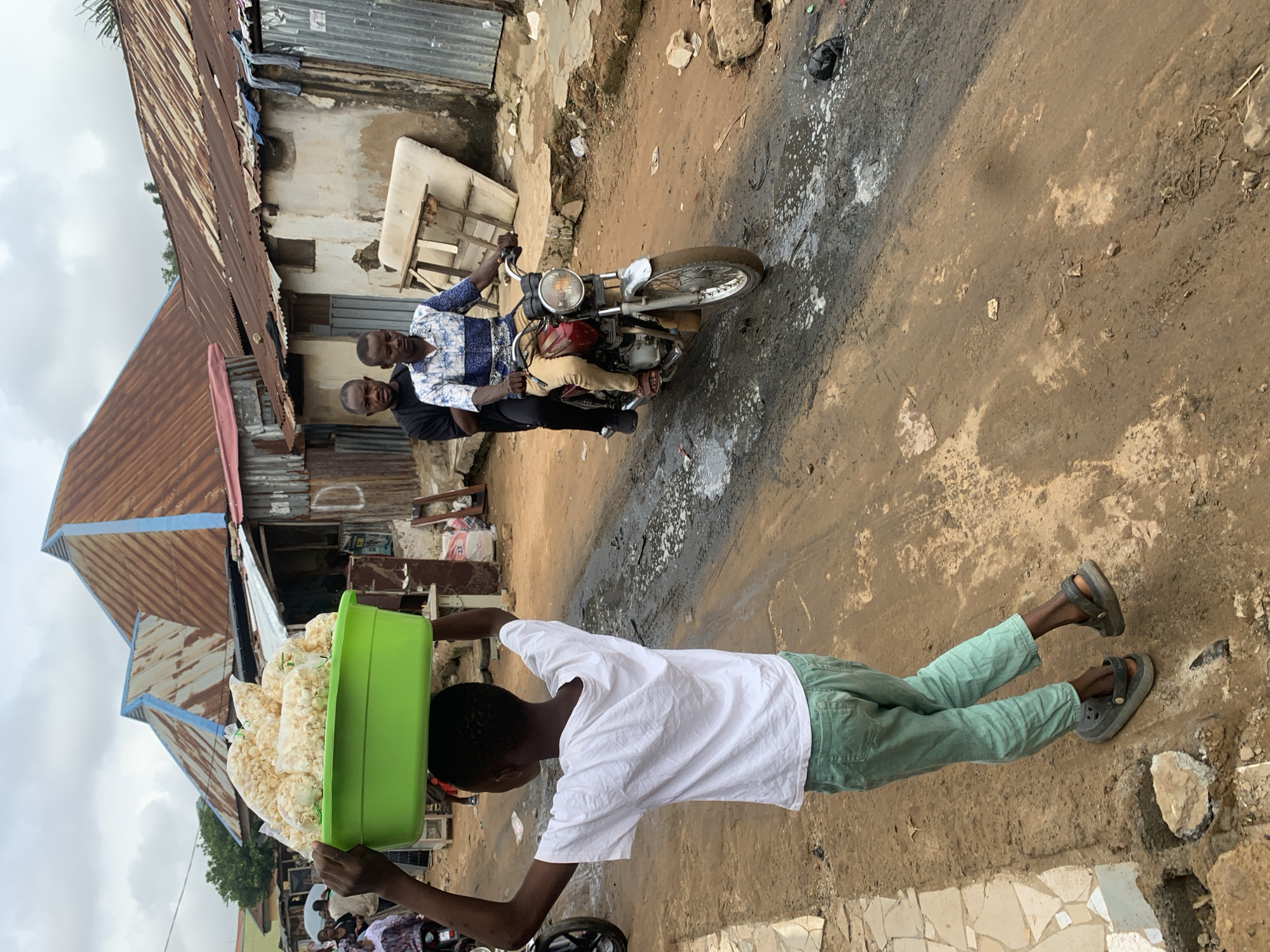 Morning activity at an informal Abuja street market