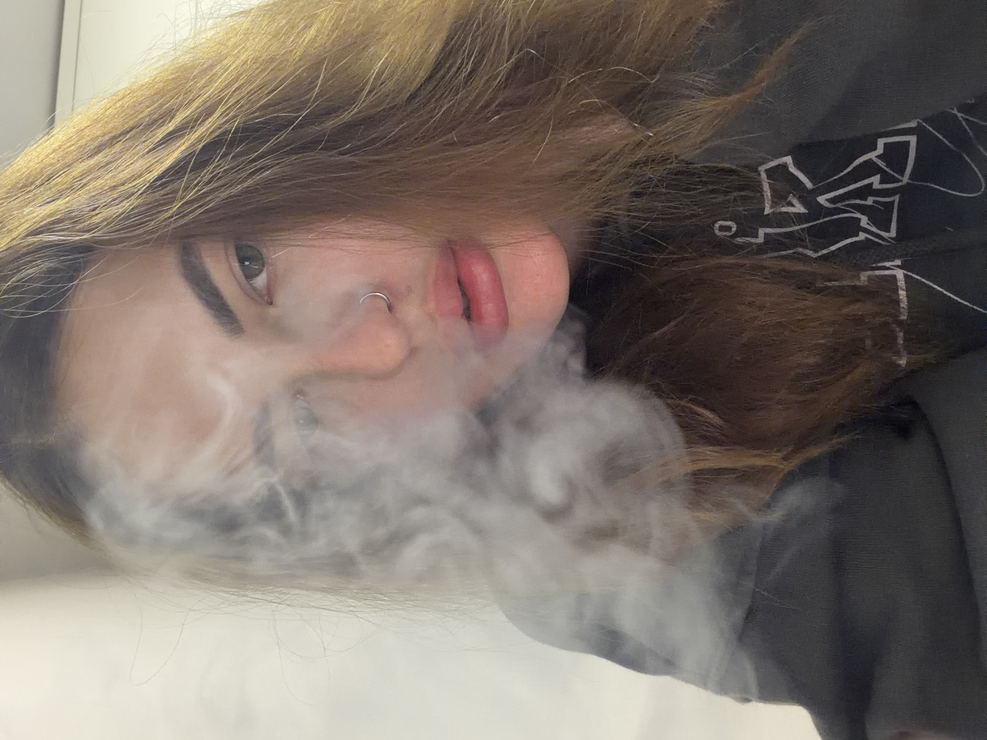 Vapor exhale and vase photographed in Krasnodar apartment
