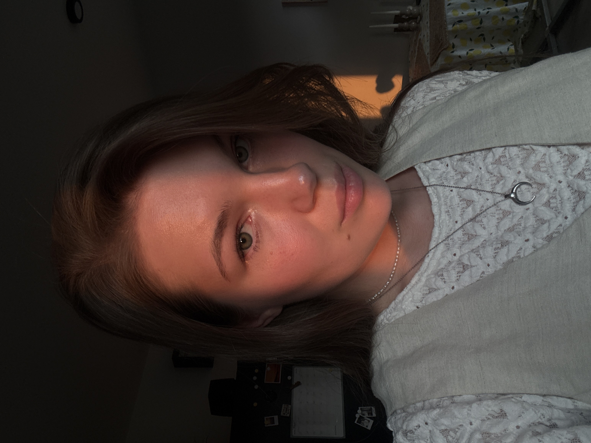 Woman photographed in sunlit indoor setting in Belgrade