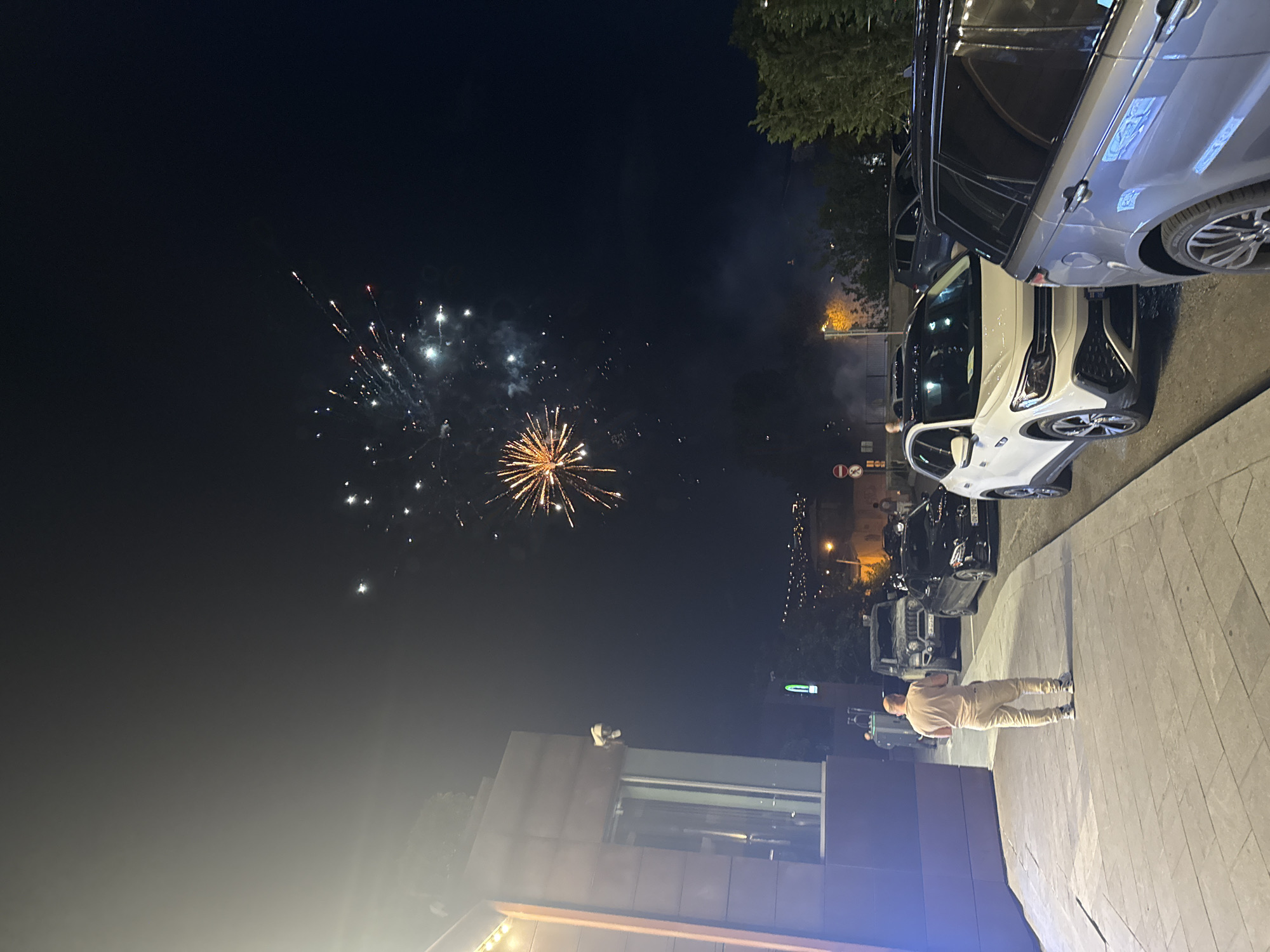 Fireworks and nightlife fill a Tbilisi summer evening