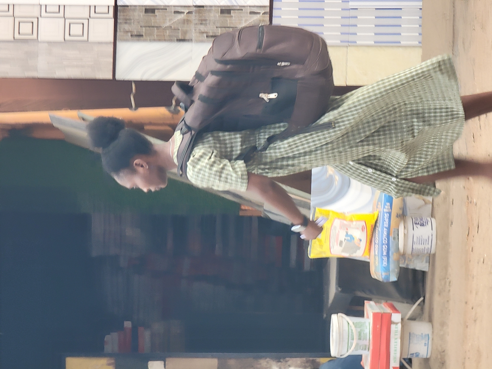 Daily street commerce documented in Maiburiji, Nigeria afternoon