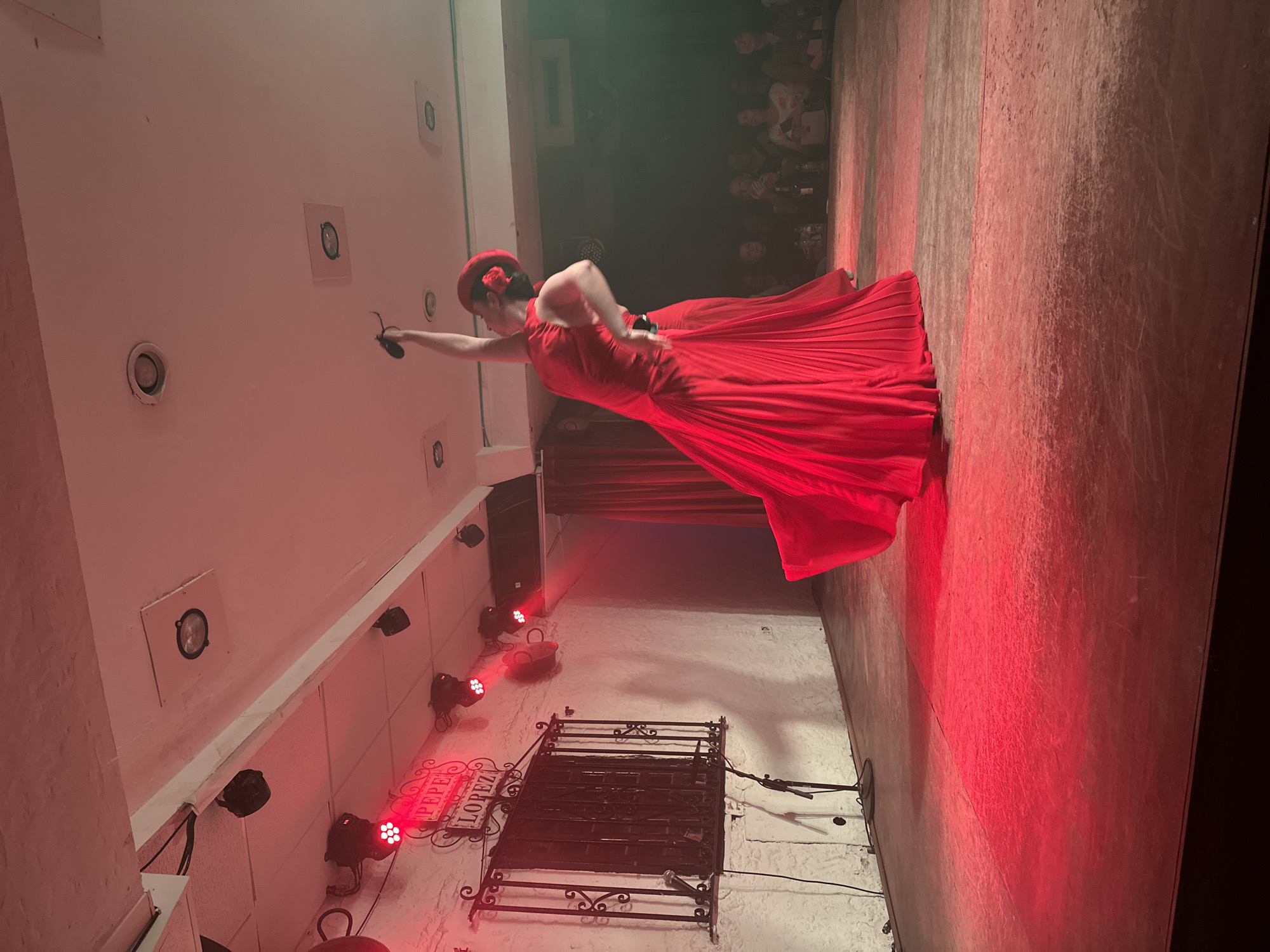 Solo dancer performs in red dress at Torremolinos venue