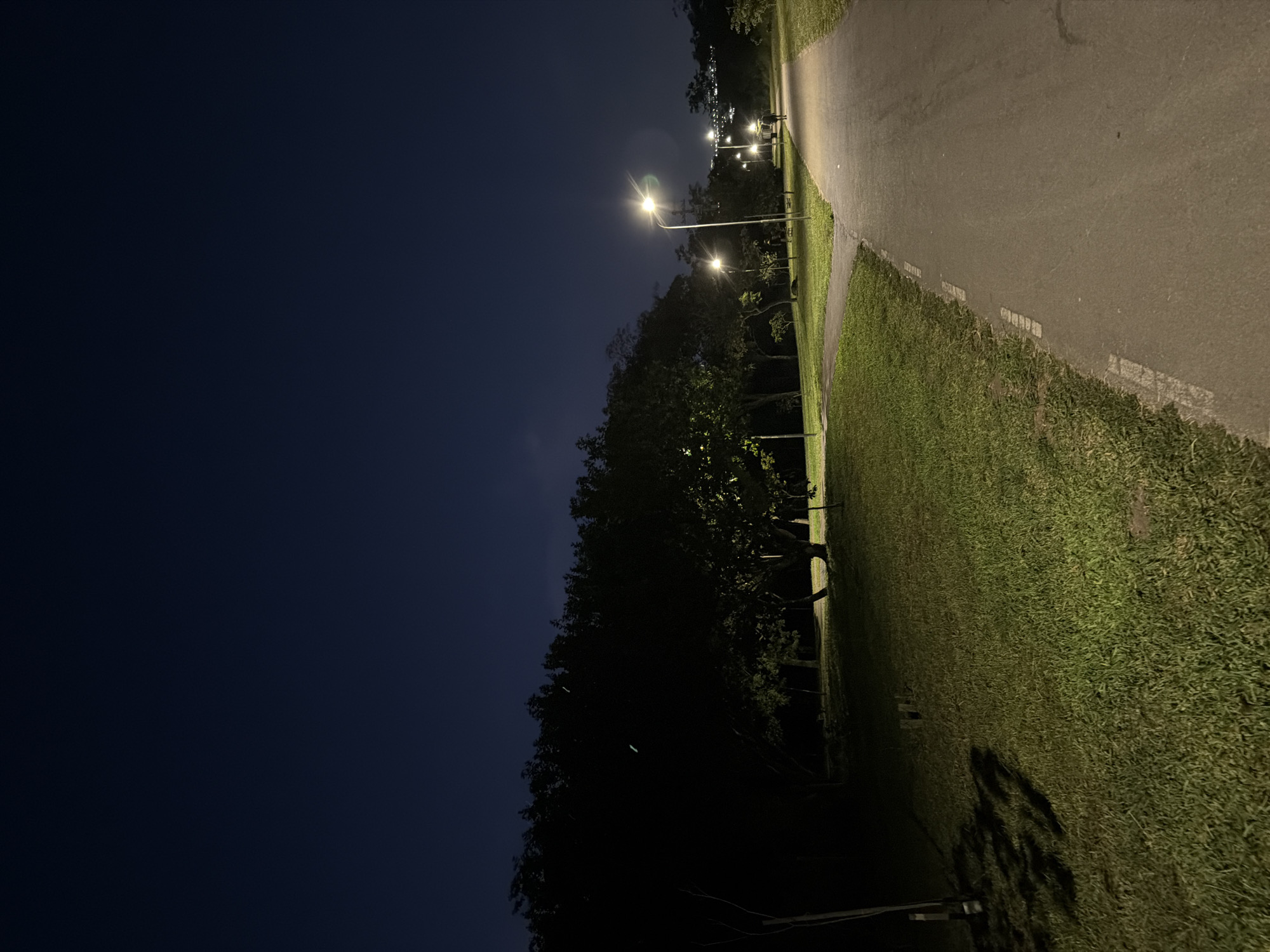 Evening streetlights and illuminated buildings observed in Brasília