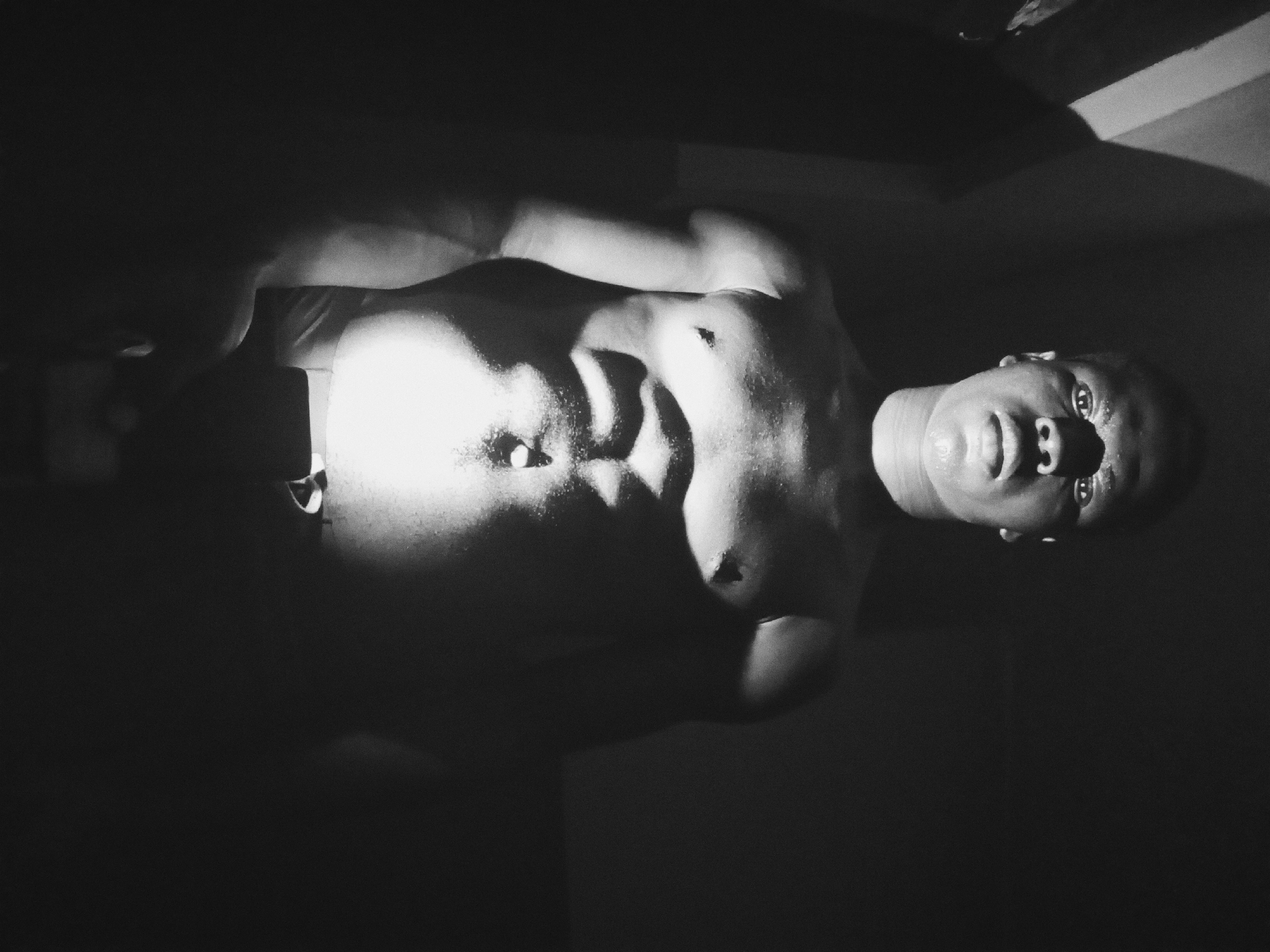 Man photographed in low-light indoor setting in Nkpor, Nigeria