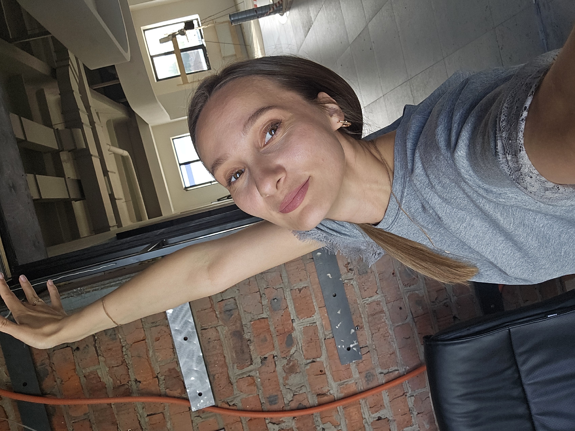 Woman holds photo session in industrial space, Chaikovsky