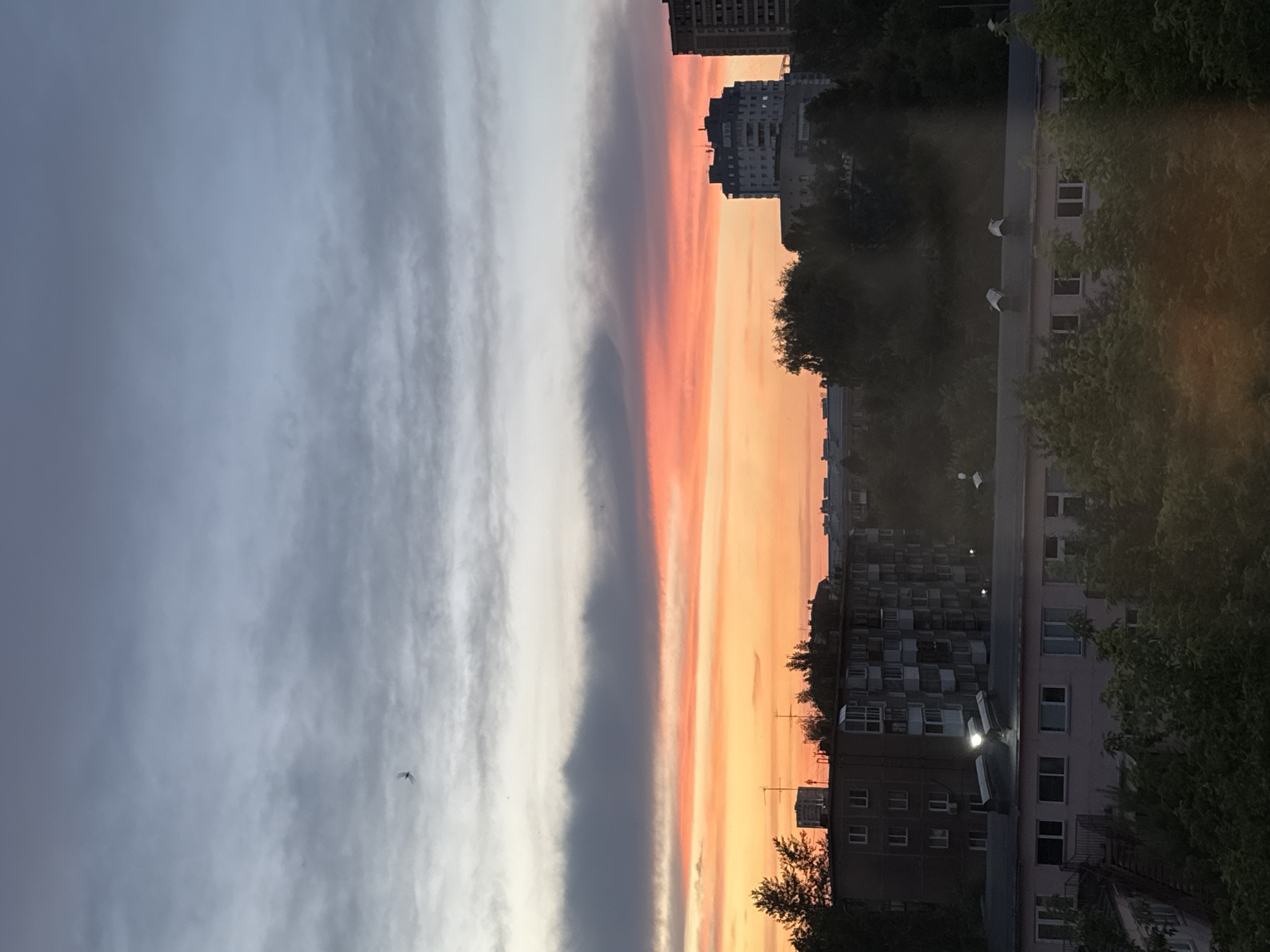 City skyline at golden hour, nine angles, one sunset