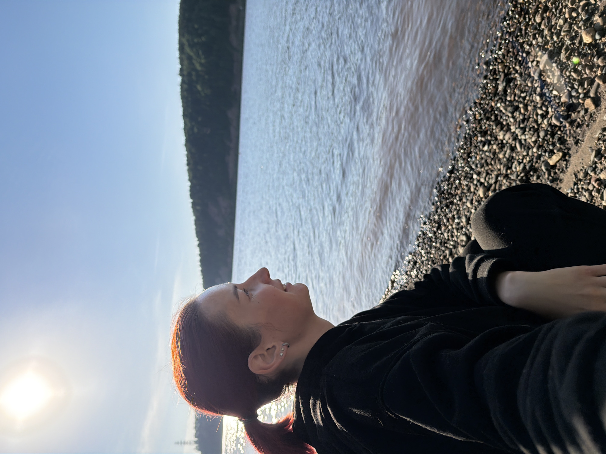 Woman observed on rocky beach near Noviy, Russia