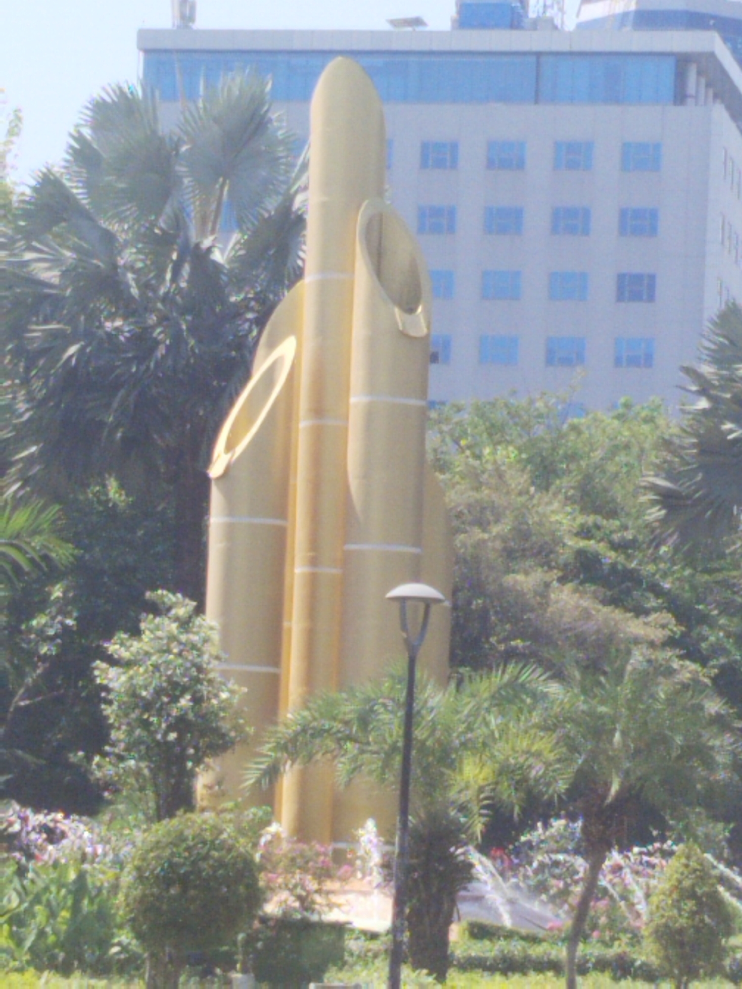 Golden monumental sculpture rises in Surabaya, Indonesia