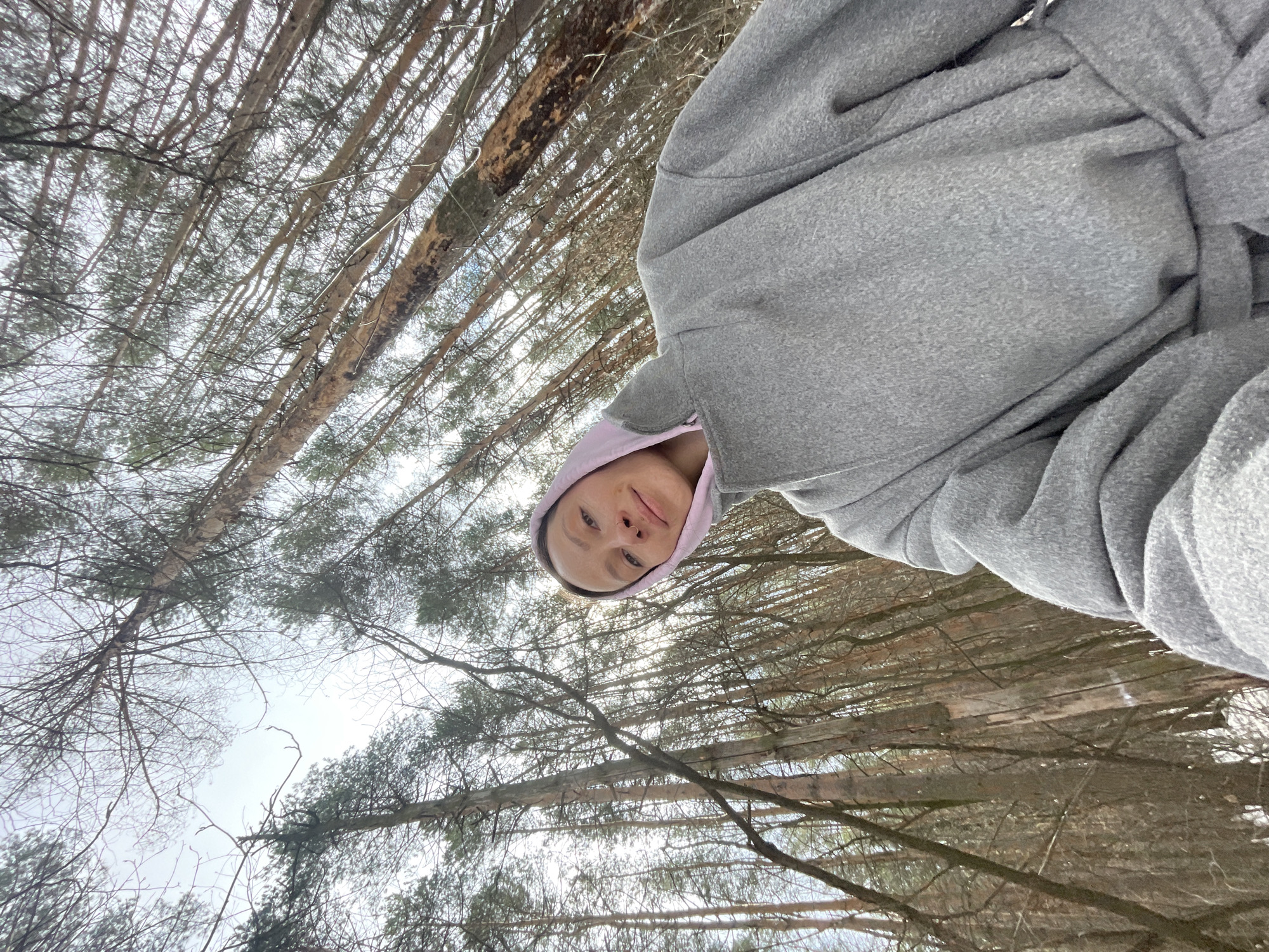 Woman takes selfie in forest near Izhevsk, Russia