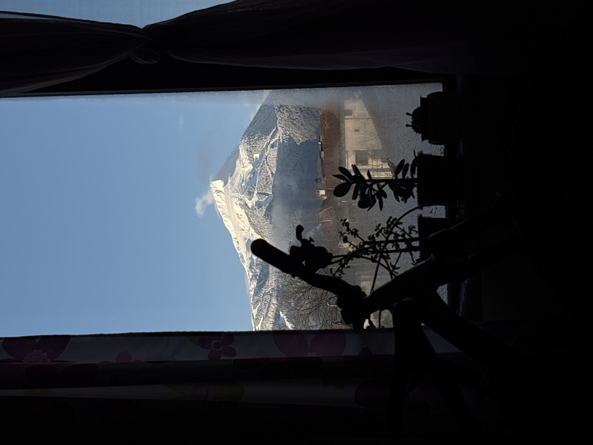 Morning mountain views captured from windows in Bansko, Bulgaria