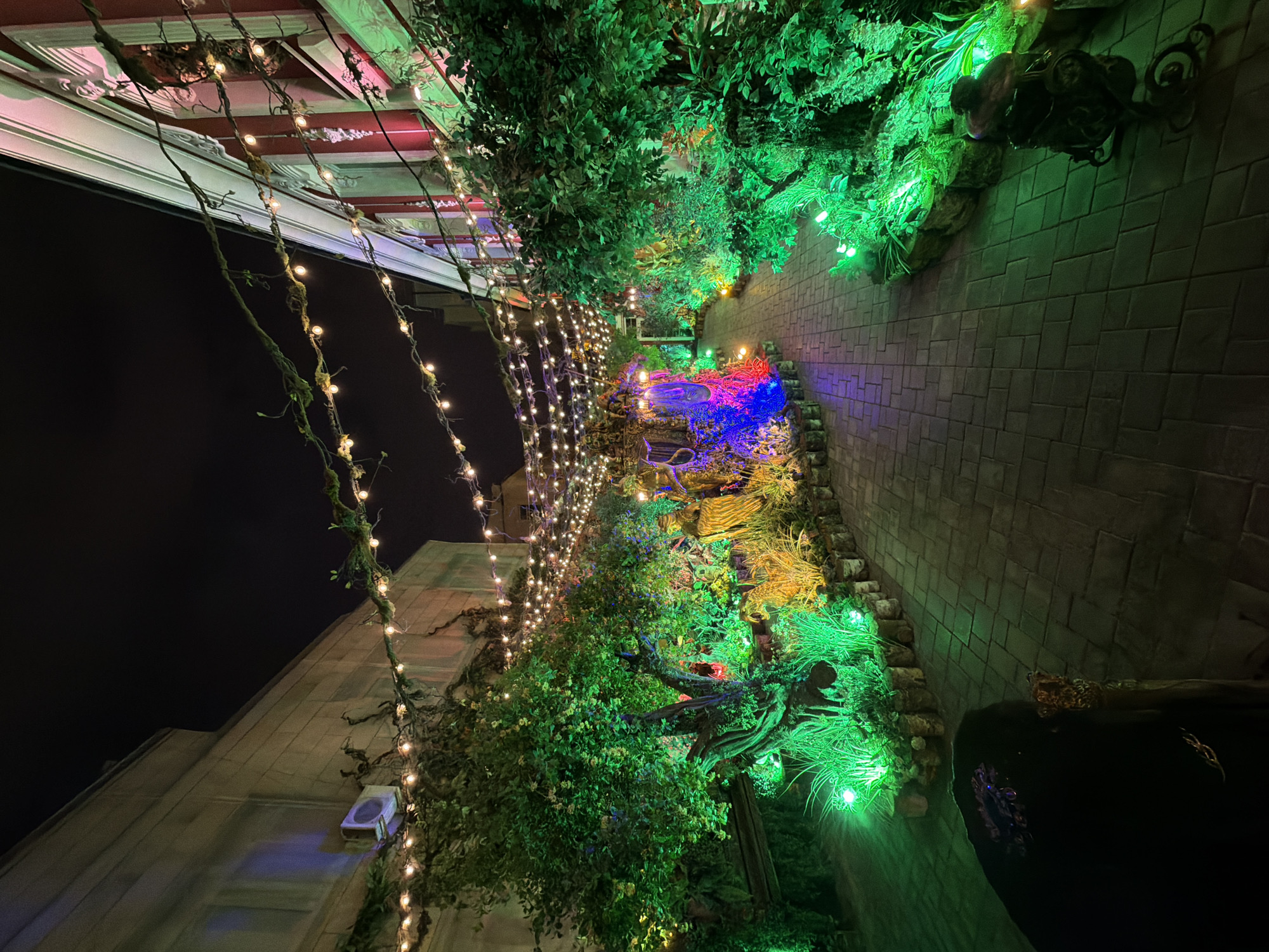 Moscow building features illuminated fantasy dioramas in decorated windows