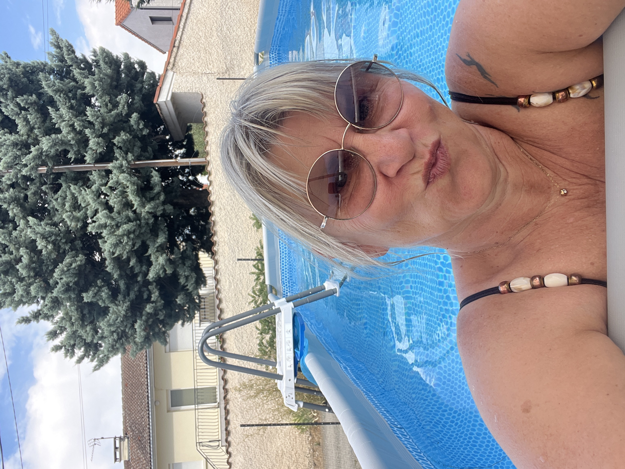 Poolside selfie on a summer day in Loire, France