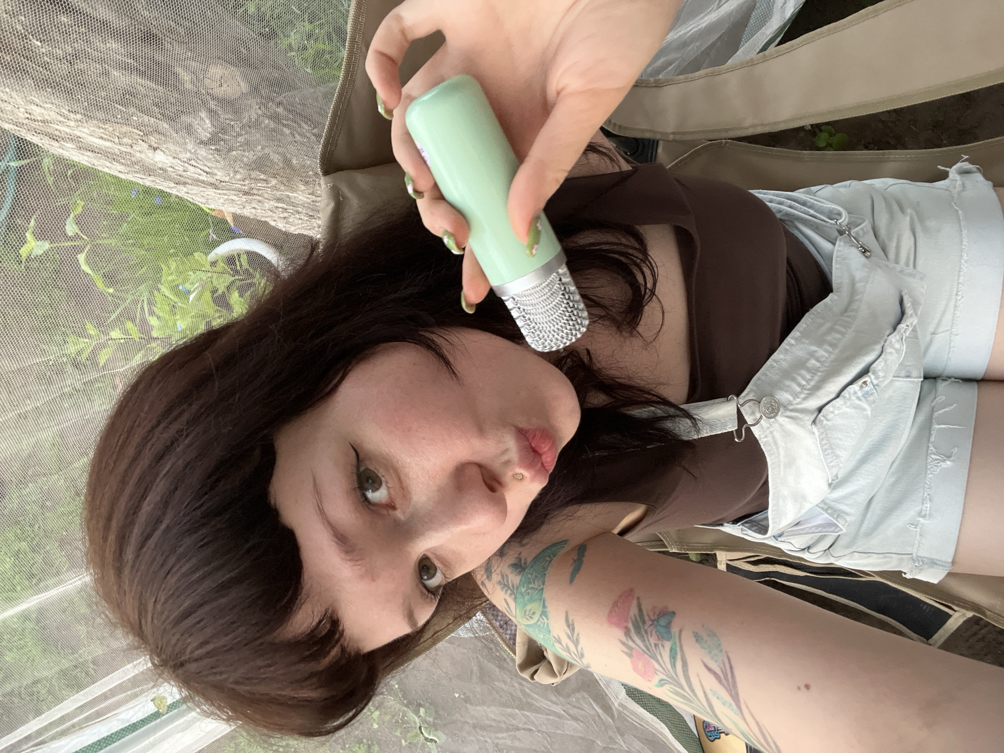 Mic in hand and a dog's teeth: casual indoor moments in Chaikovsky