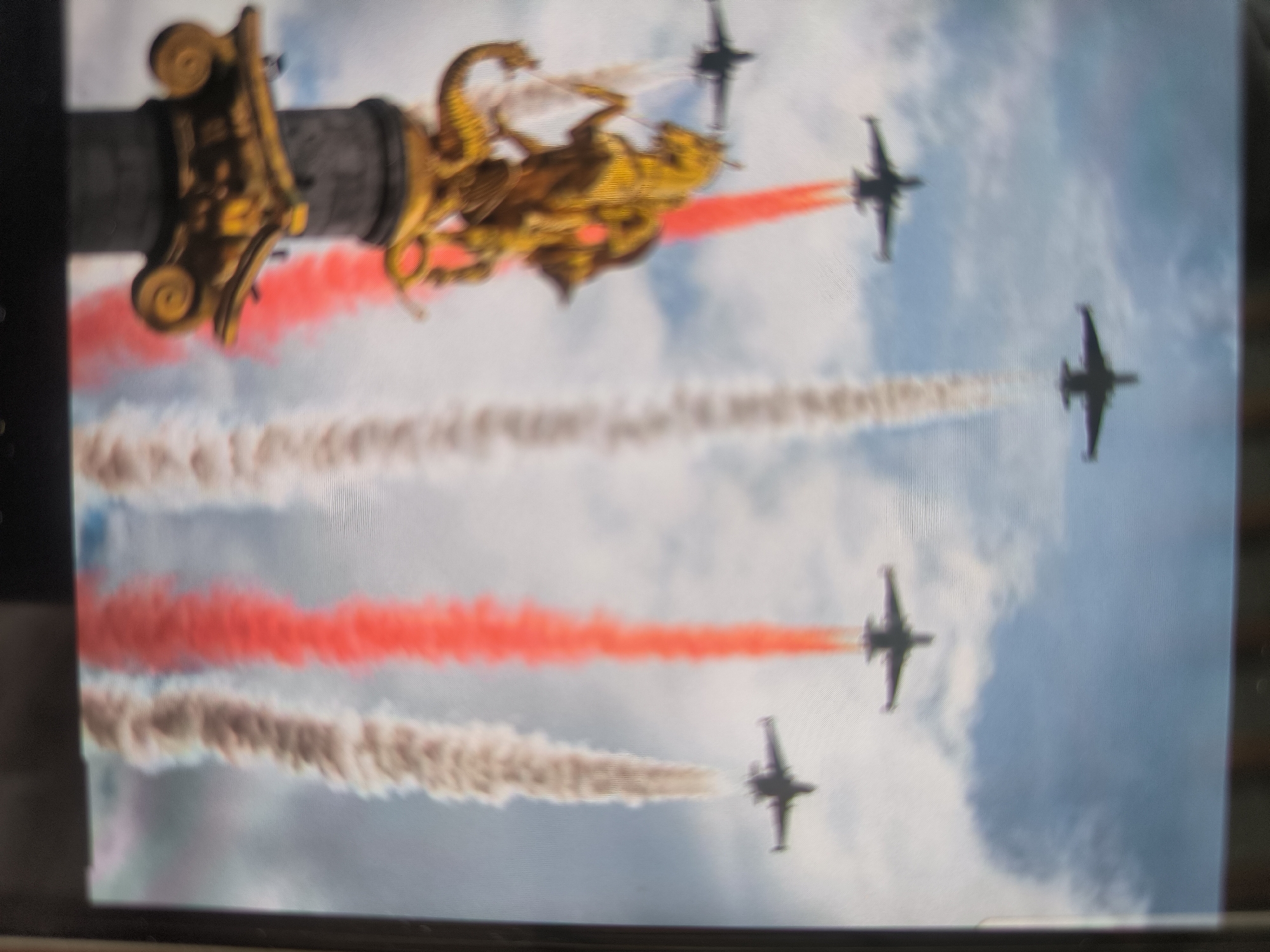 Formation jets trail smoke over Tbilisi in aerial display
