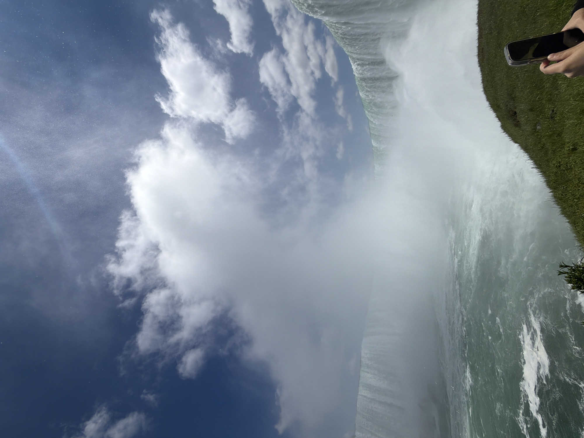 Tourist documents Horseshoe Falls views from Canadian side