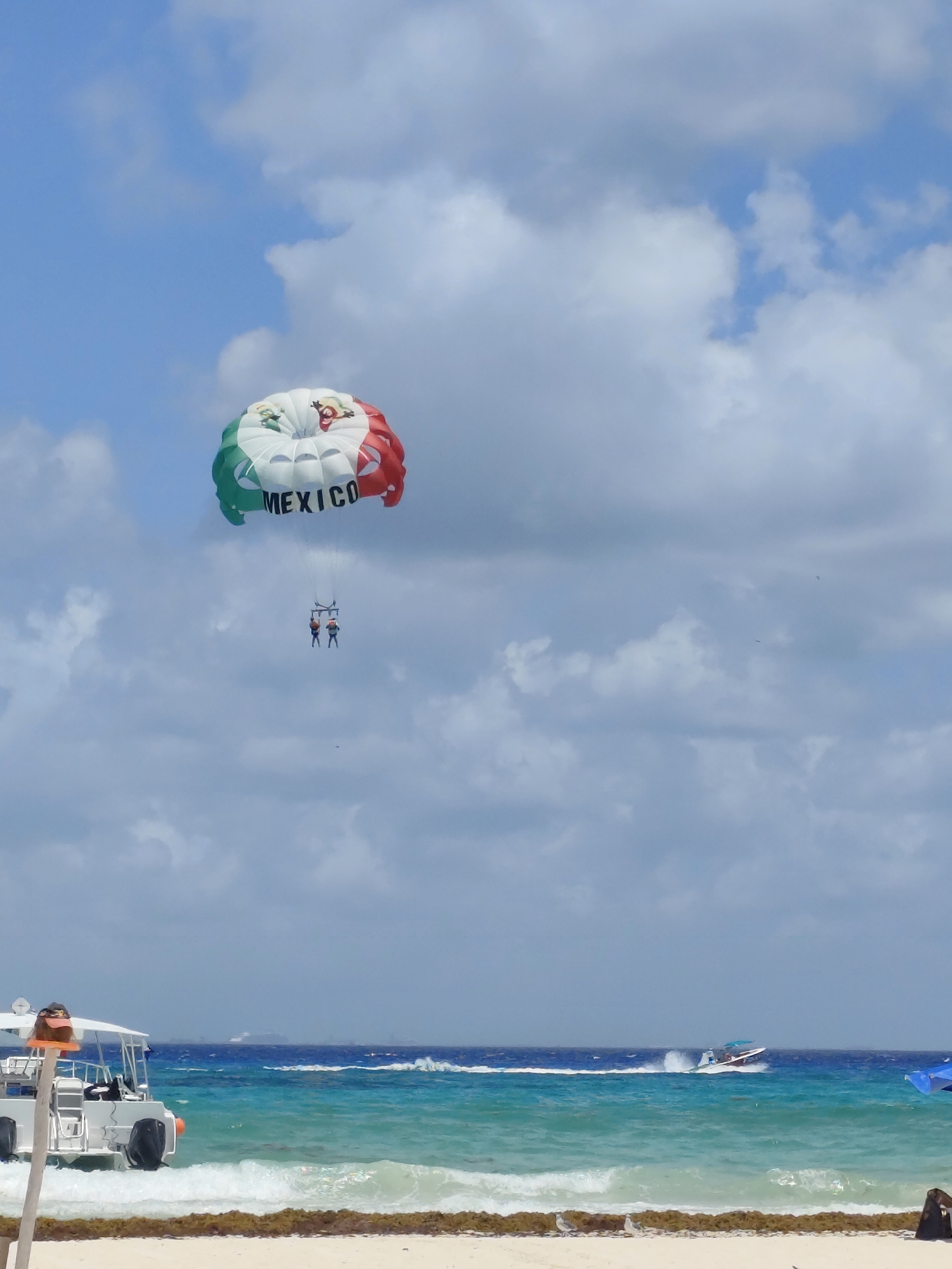 Parasailing activity observed over Playa del Carmen beach
