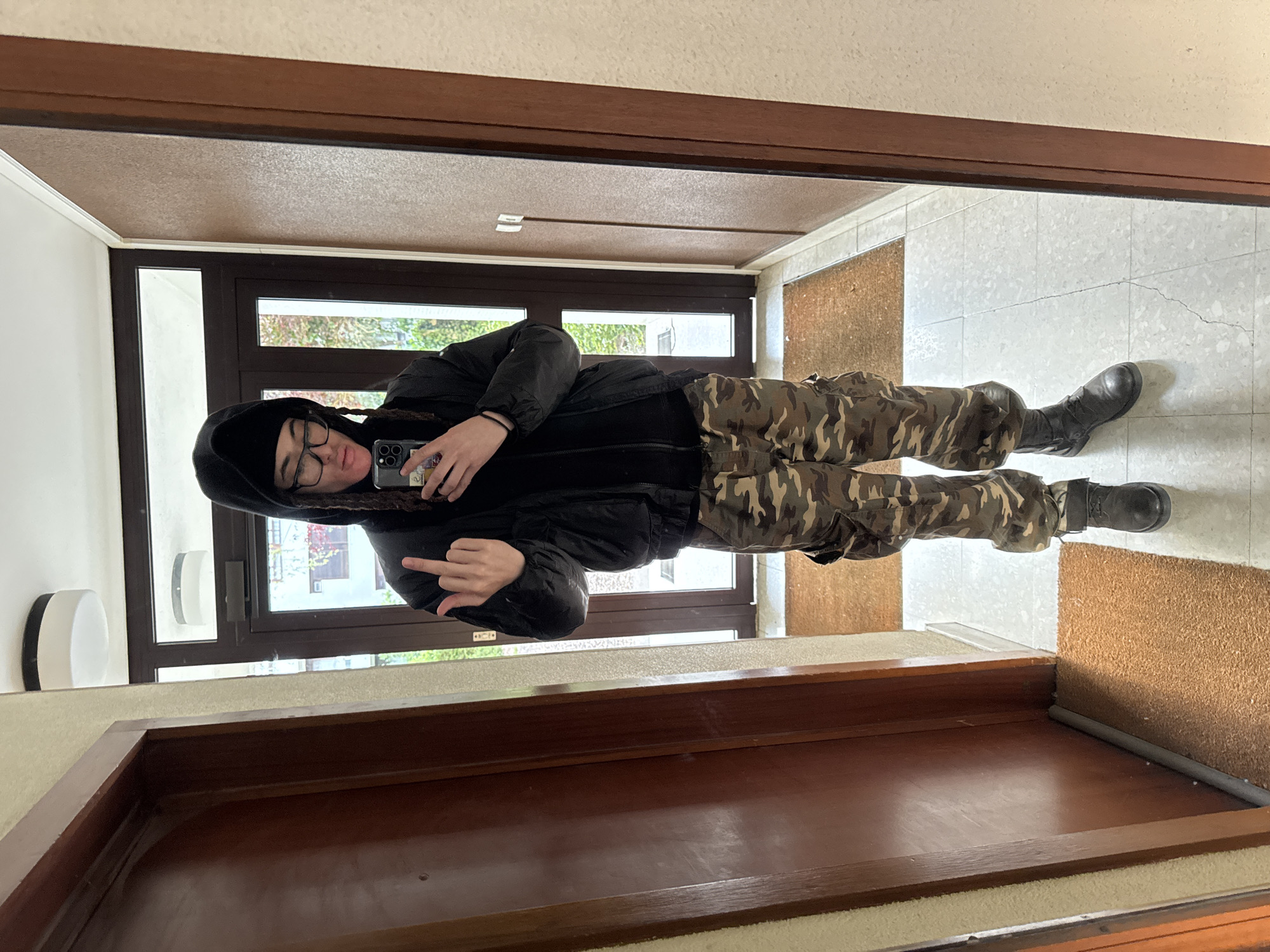 Residents take casual selfies indoors in Les Ulis