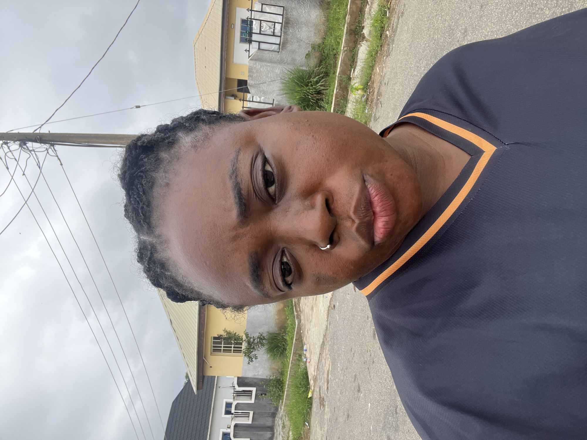 Casual morning moments on a residential street in Abuja