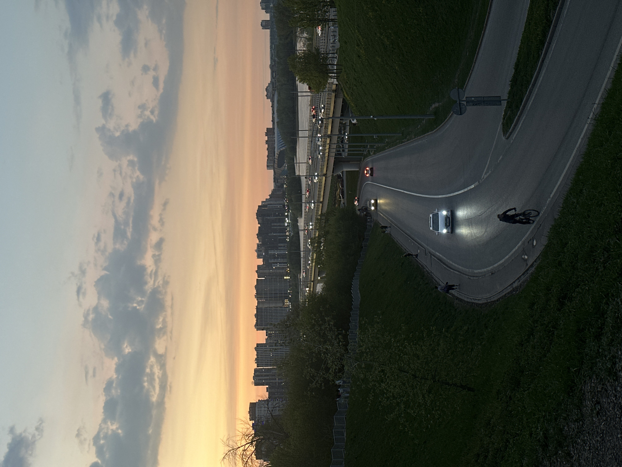 Sunset observed over Kazan skyline and river bridge