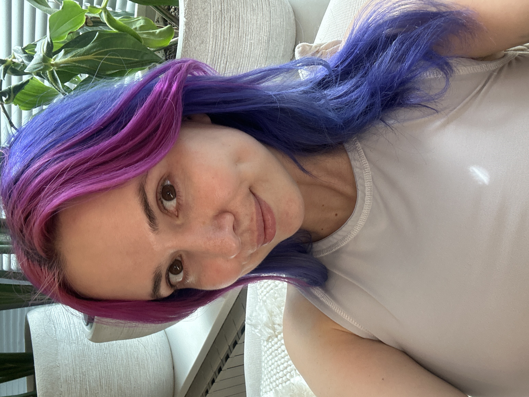 Woman with colorful hair photographed in Zagreb apartment