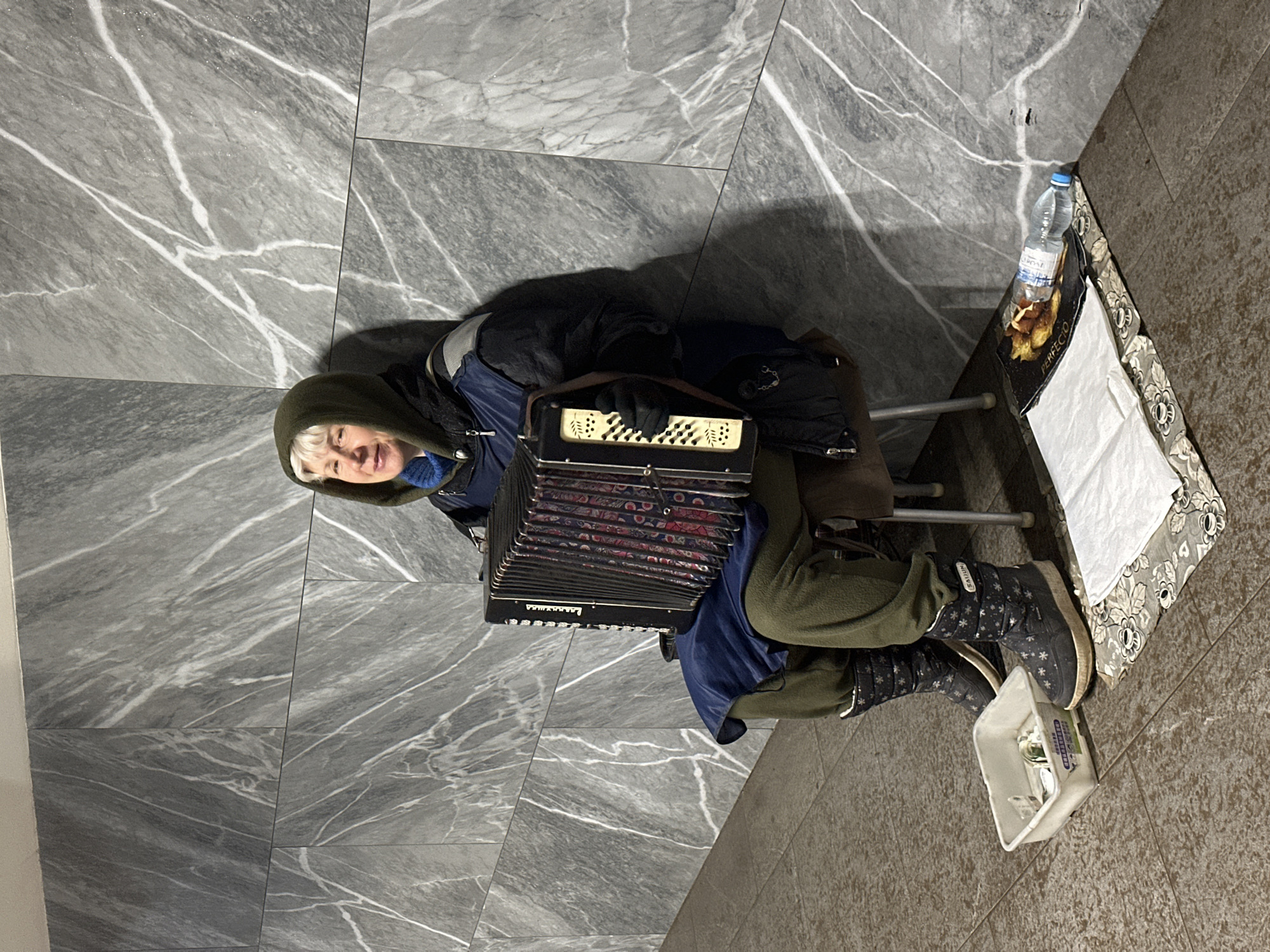 Accordion player performs in Nizhny Novgorod subway station