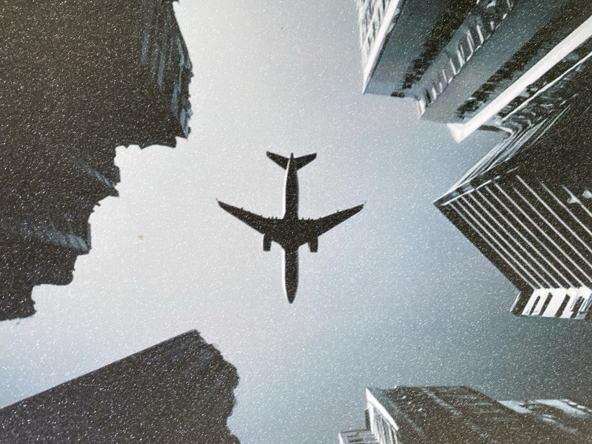 Eiffel Tower close-ups and airplane silhouettes shot from below
