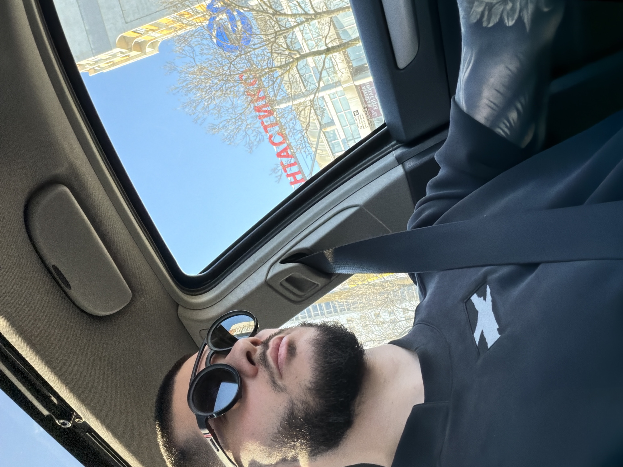 Morning drive through Sofia captured via open sunroof