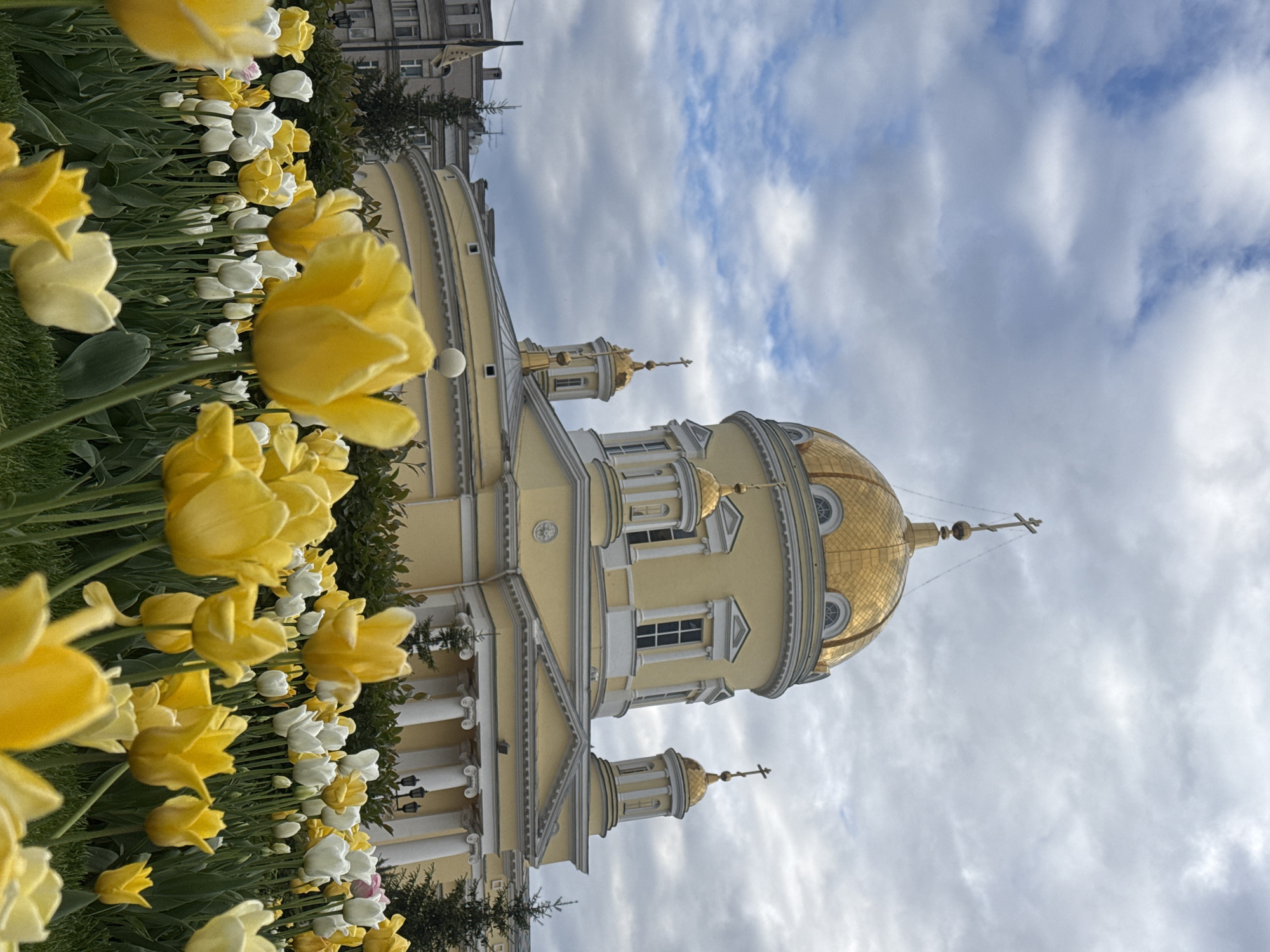 Spring tulips frame historic Church on Blood in Yekaterinburg