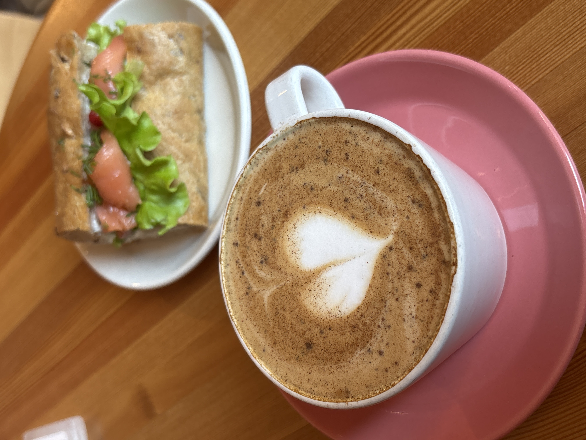 Salmon sandwich and coffee documented in northwestern Russia