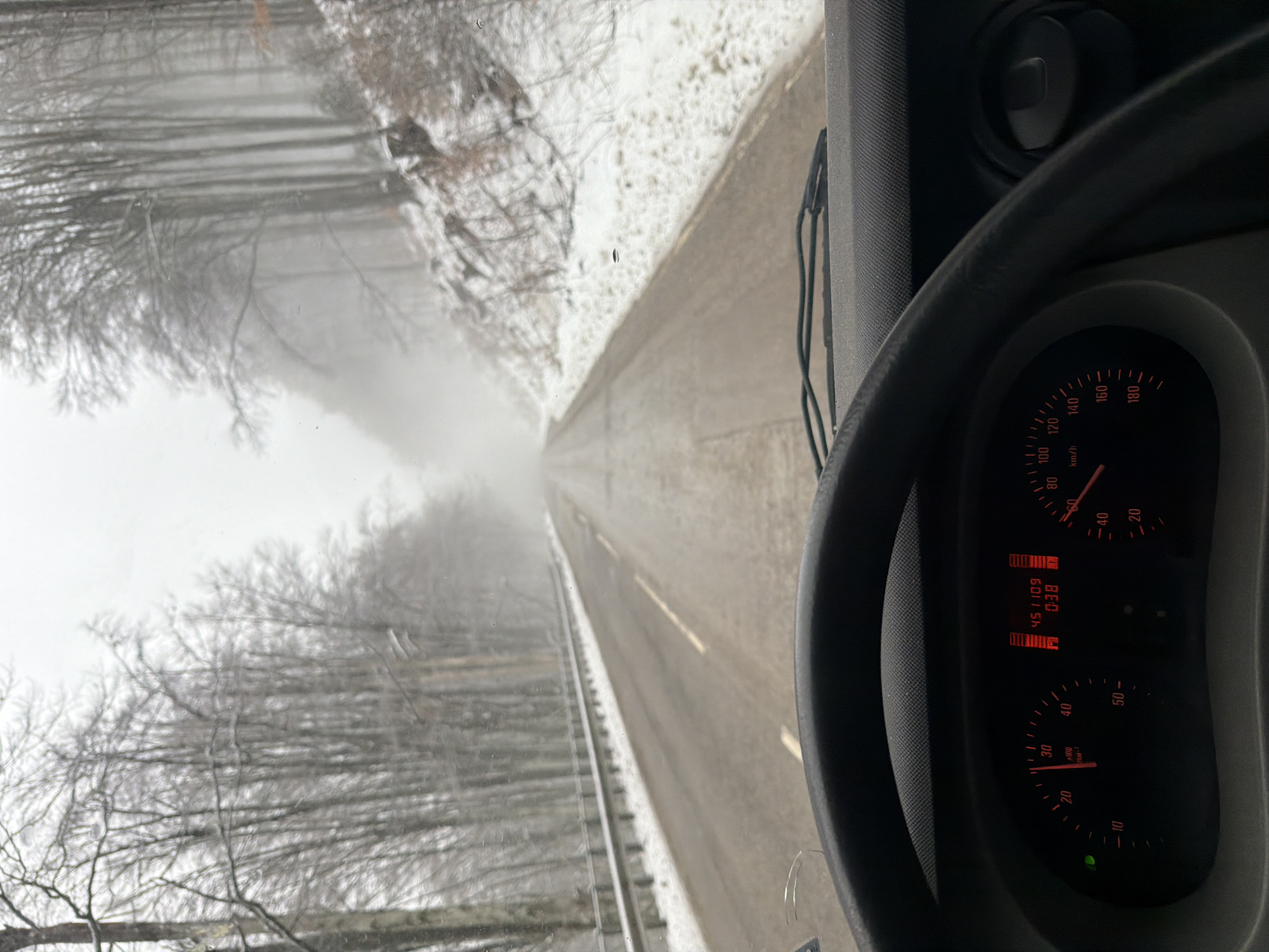 Morning drive through foggy, snowy conditions in Bulgaria