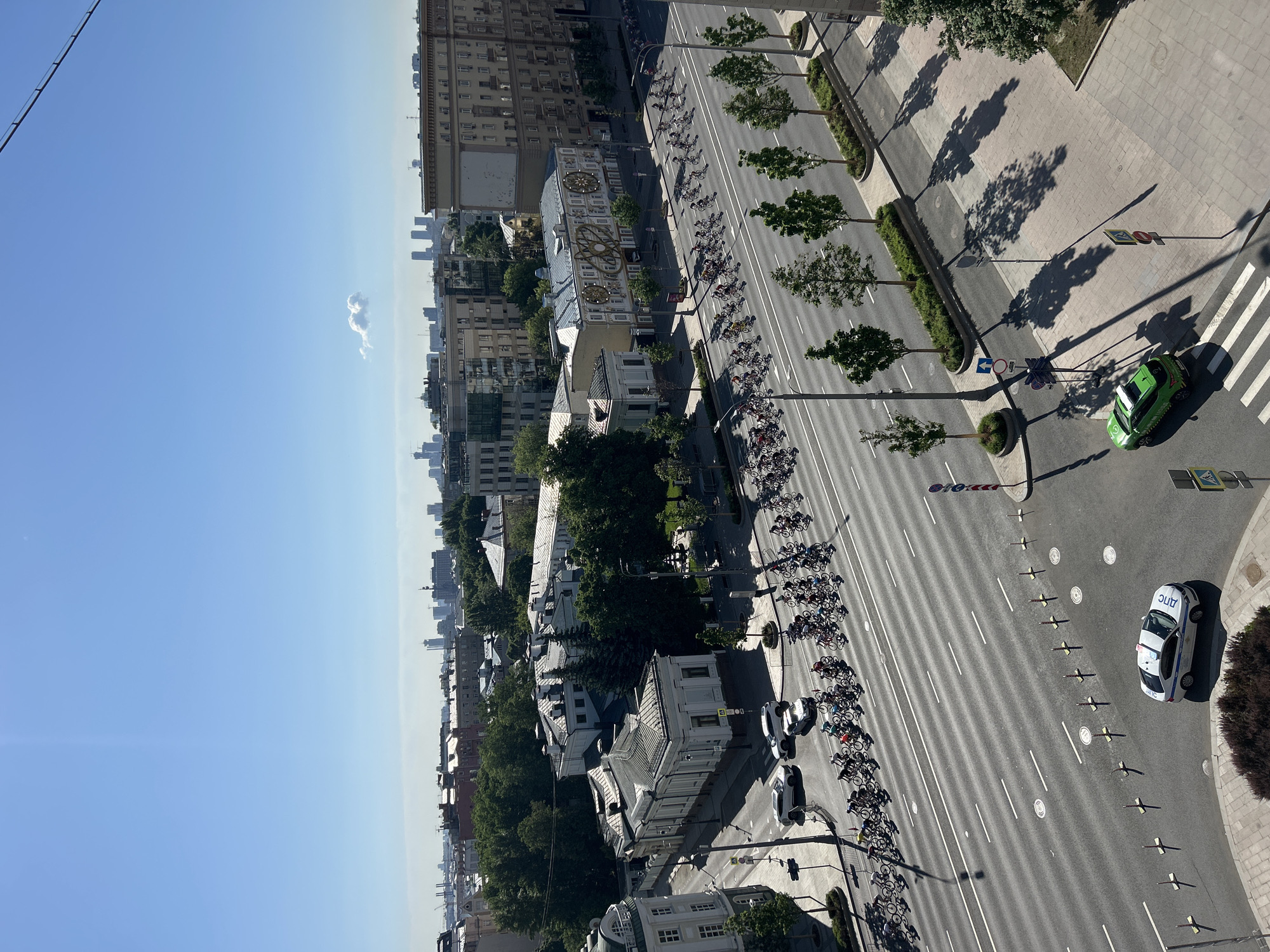 Cycling group travels Moscow street in morning formation