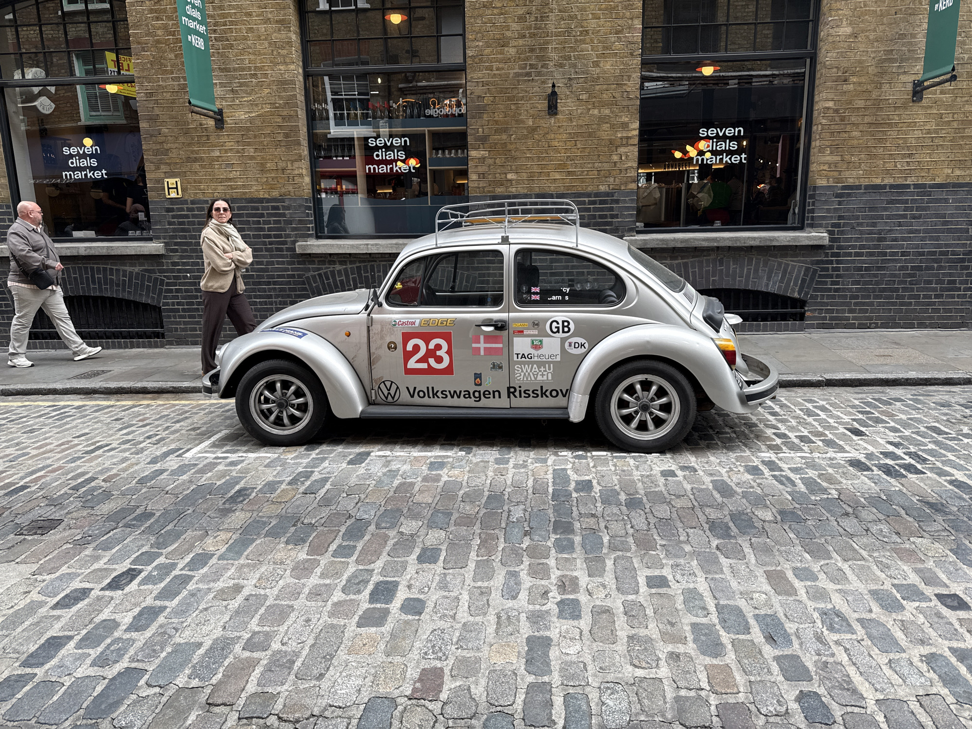Decorated VW Beetle and luxury shopping documented in central London