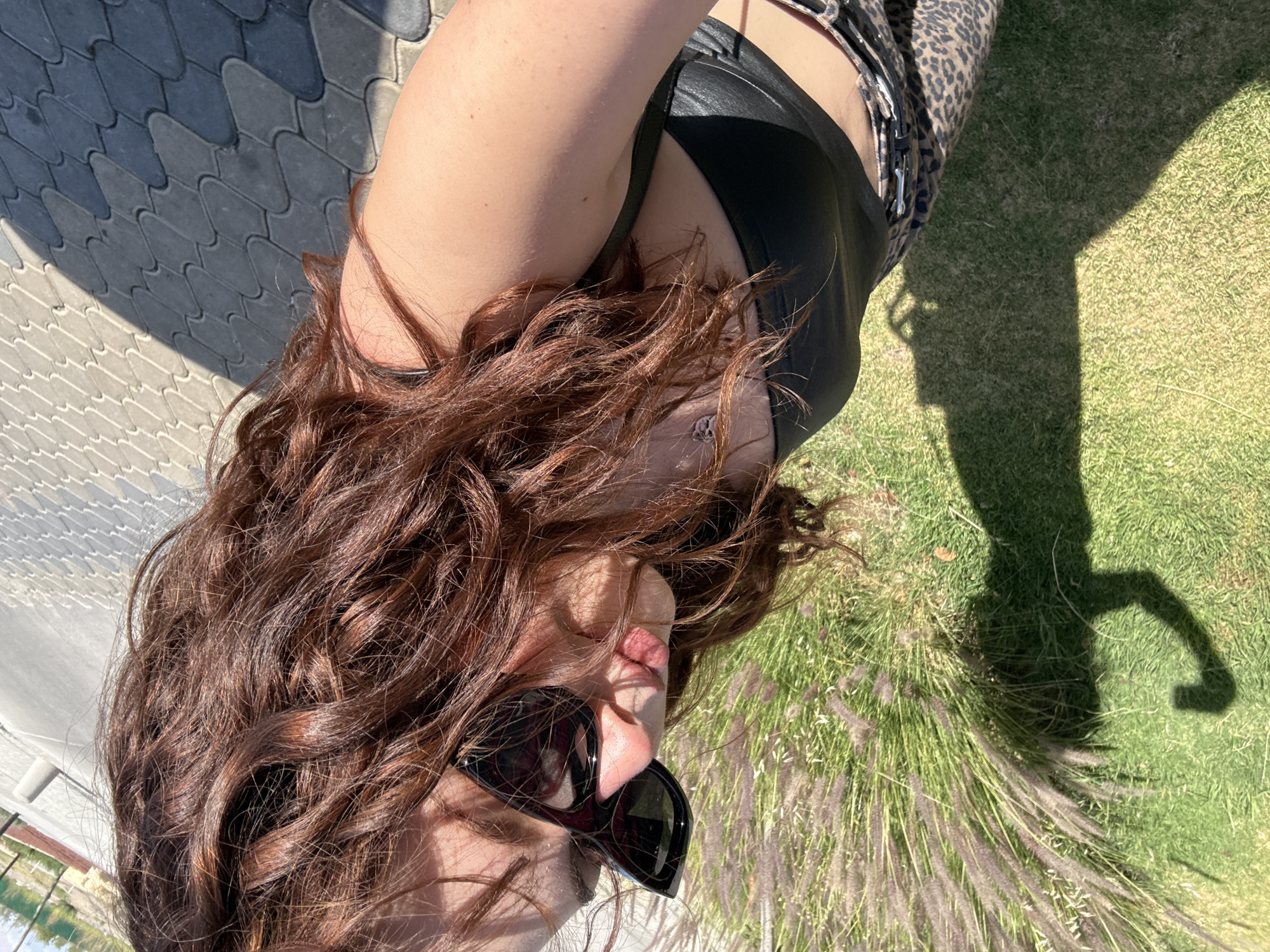Woman in leopard print lies on ground in Mexico