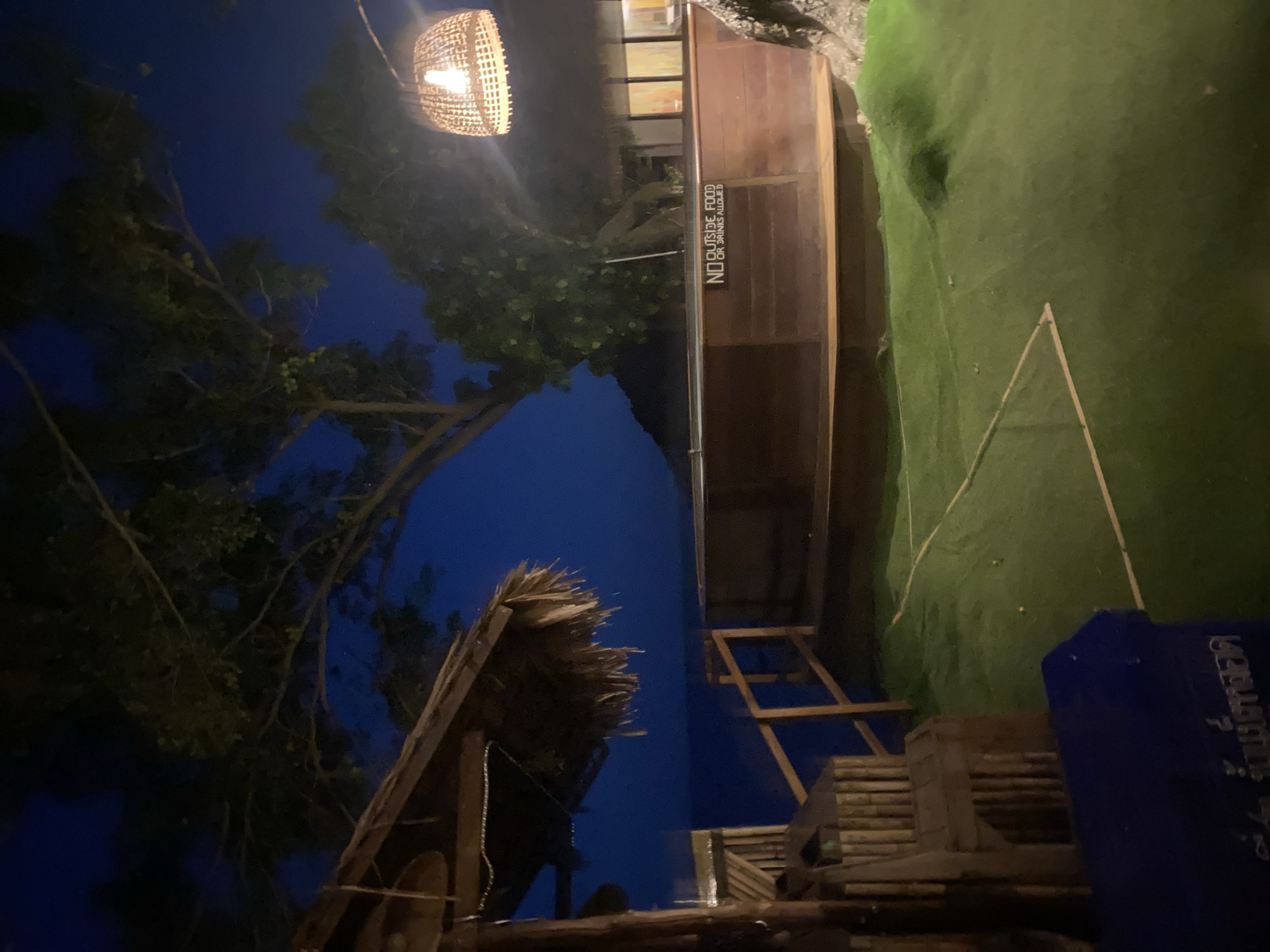 Nighttime scenes captured at outdoor venue in Ban Tai, Thailand