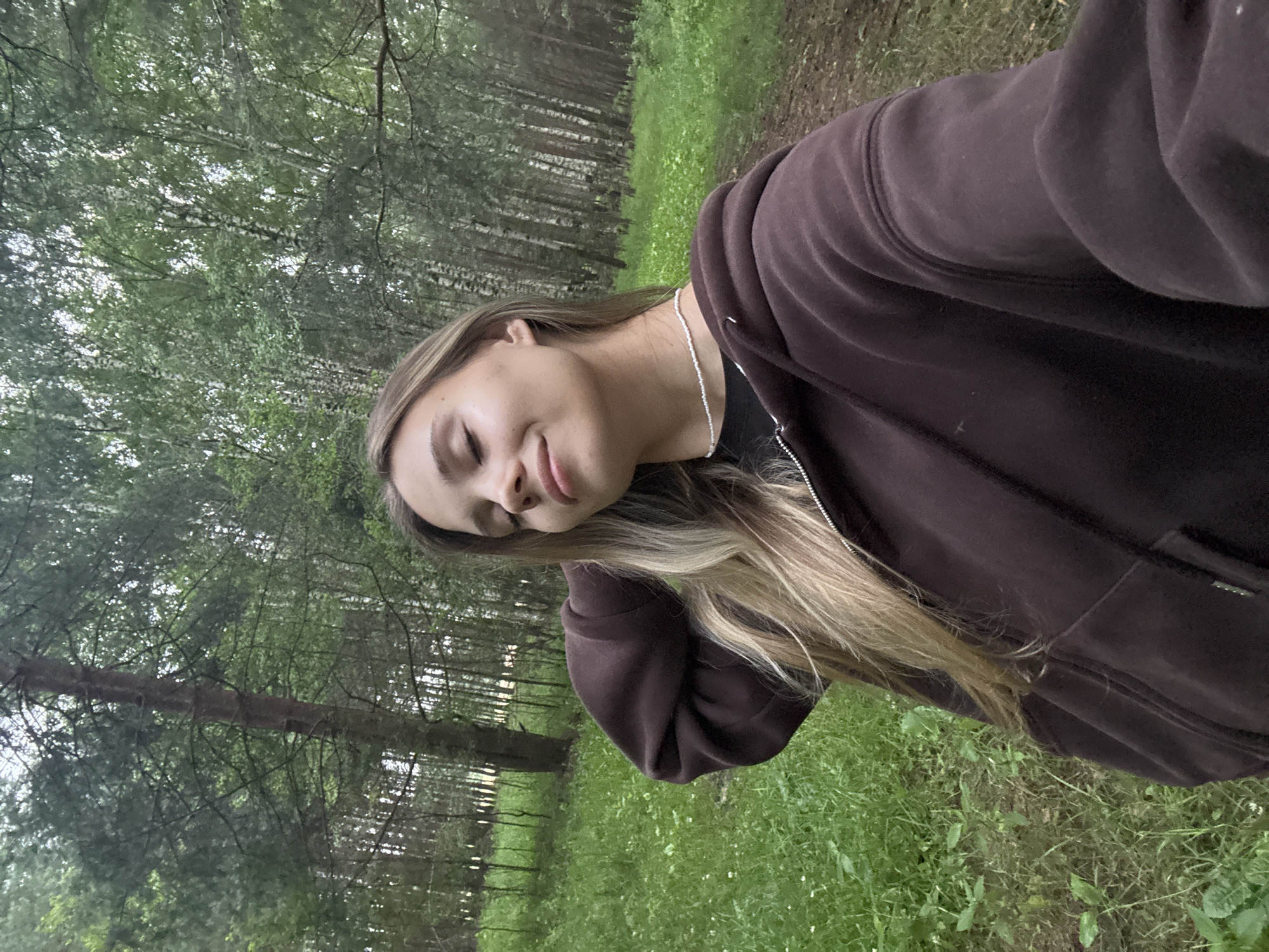 Dog walk through a pine forest in Chaikovsky