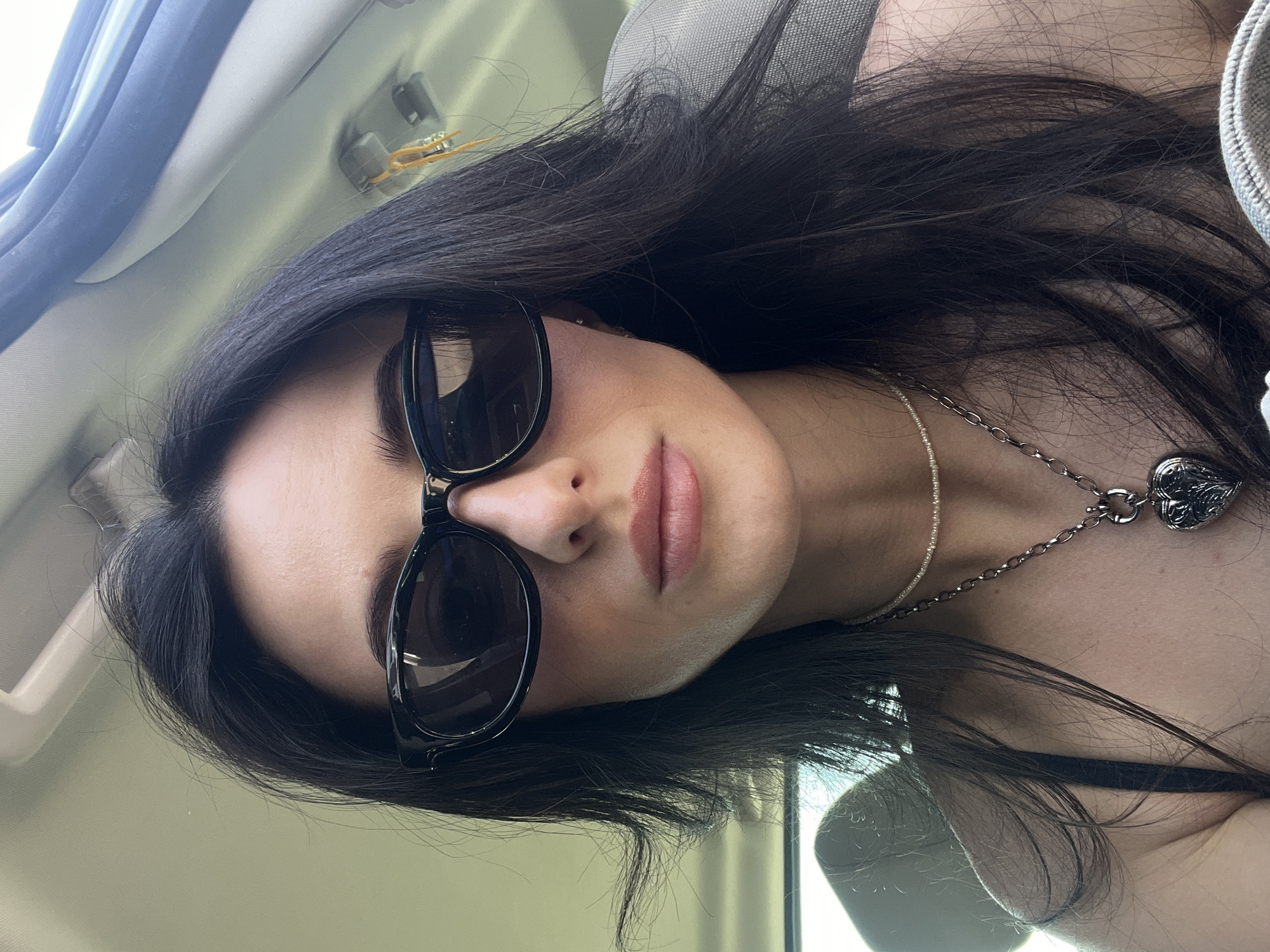 Sunglasses selfie from inside a car in Lviv