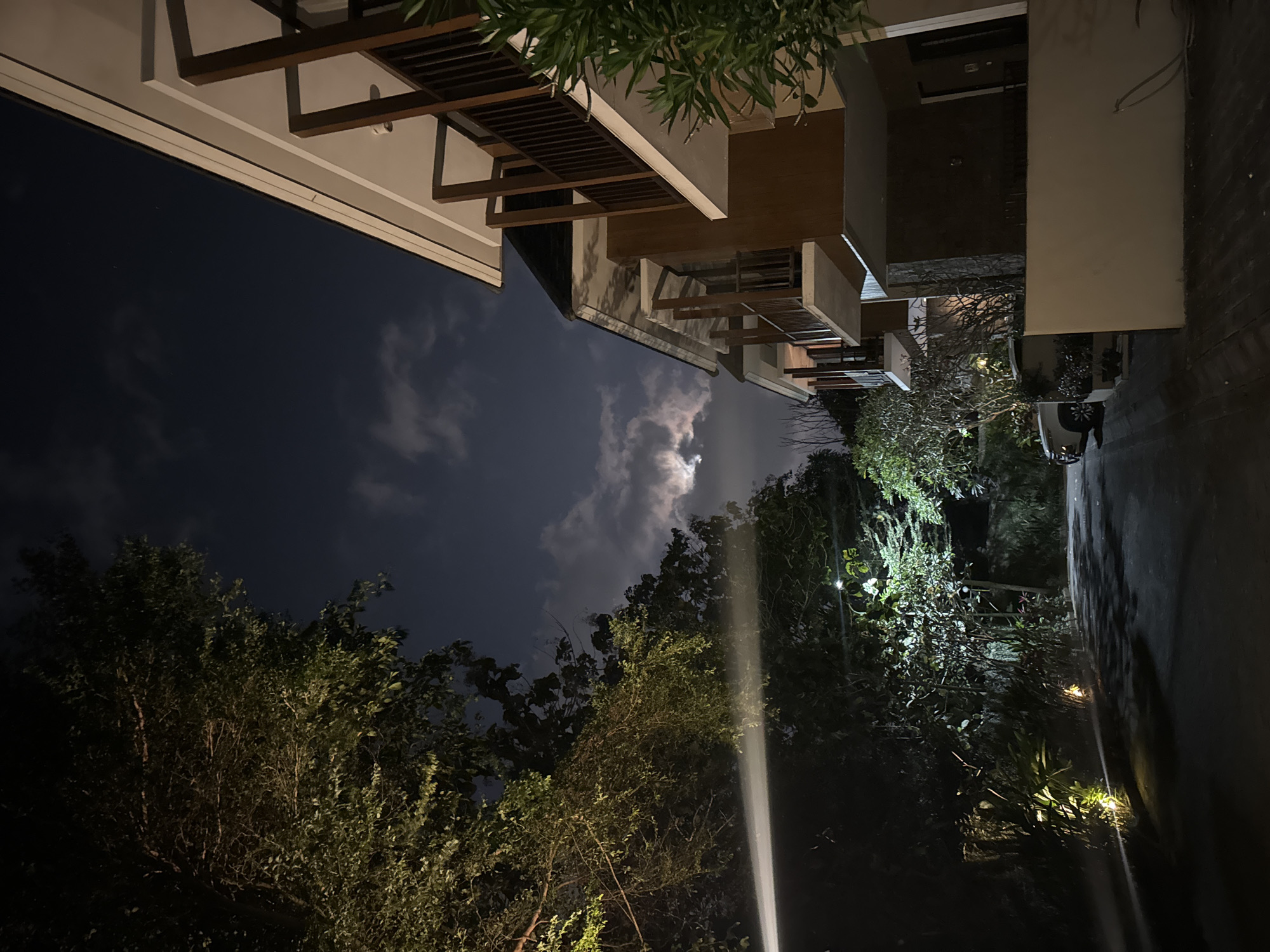 Full moon night over Kuta Selatan's resort streets and gardens
