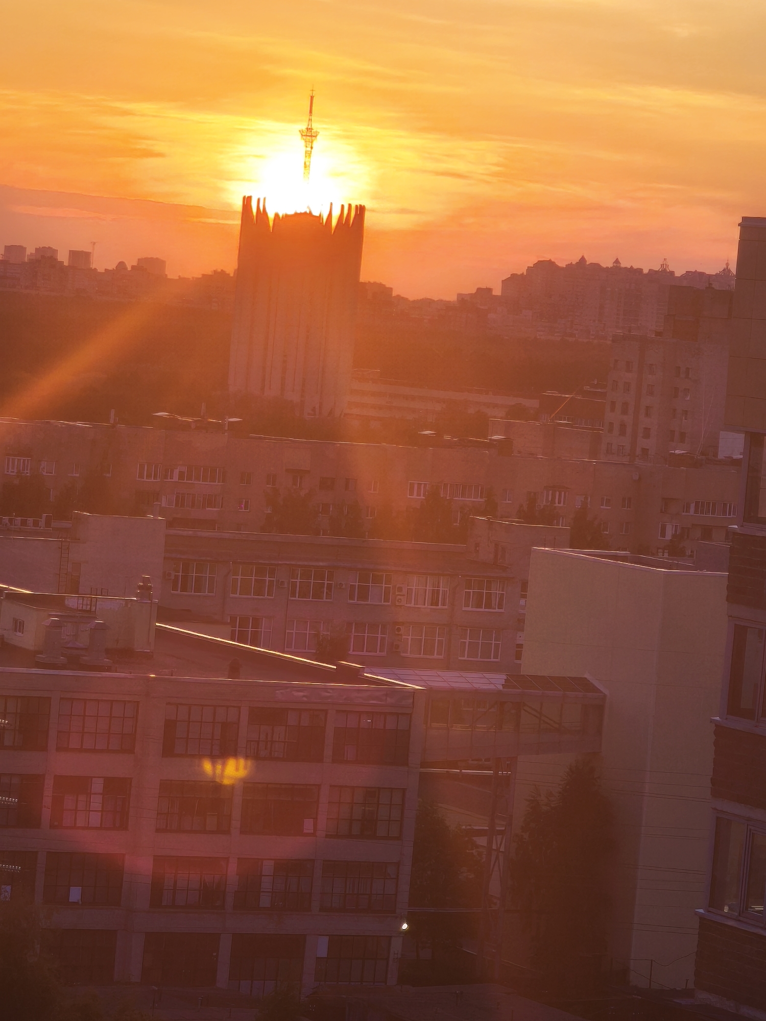 Sunset documented behind Saint Petersburg landmarks and TV tower