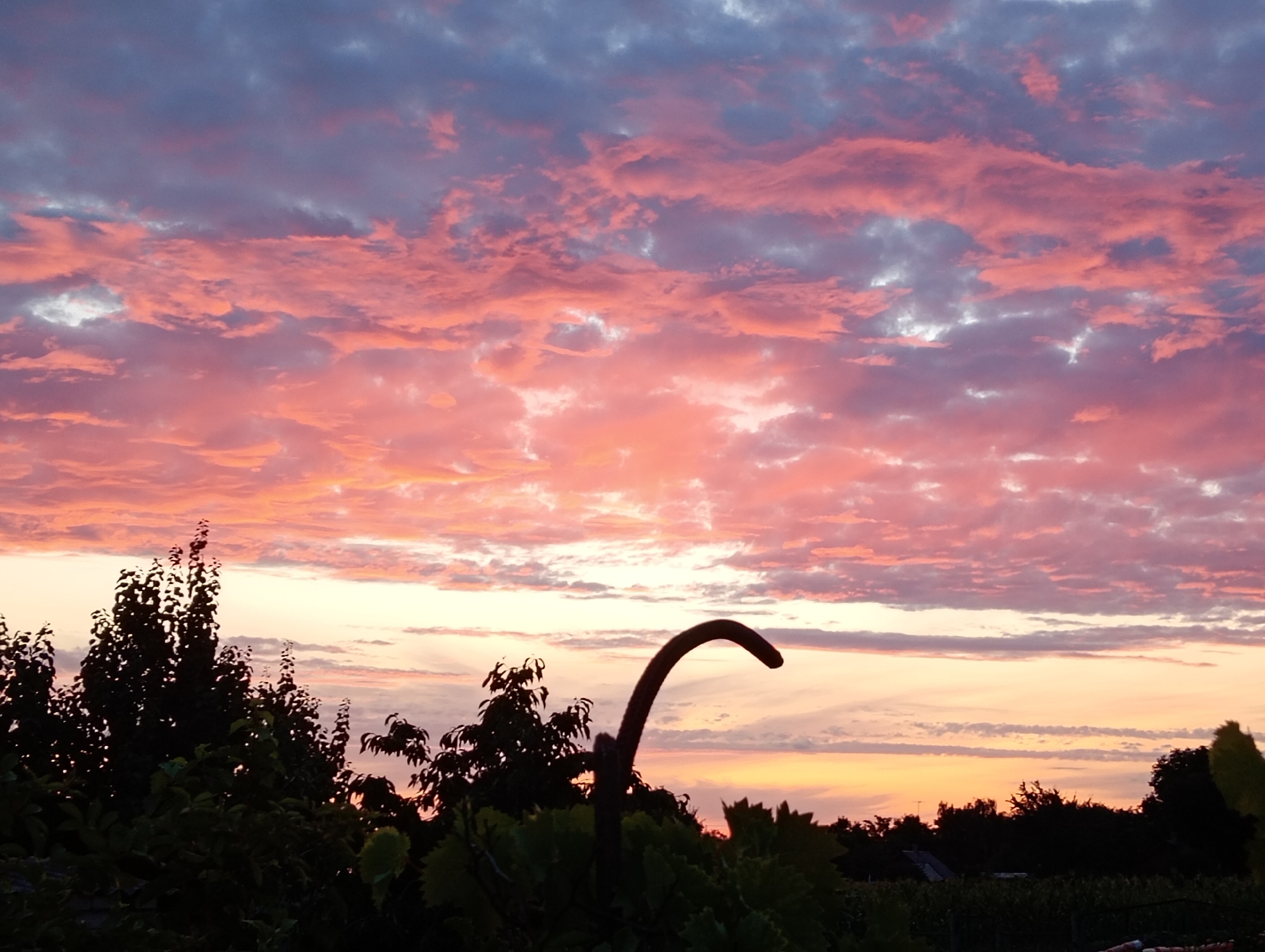 Vivid sunset over rural Marynivka, Ukraine