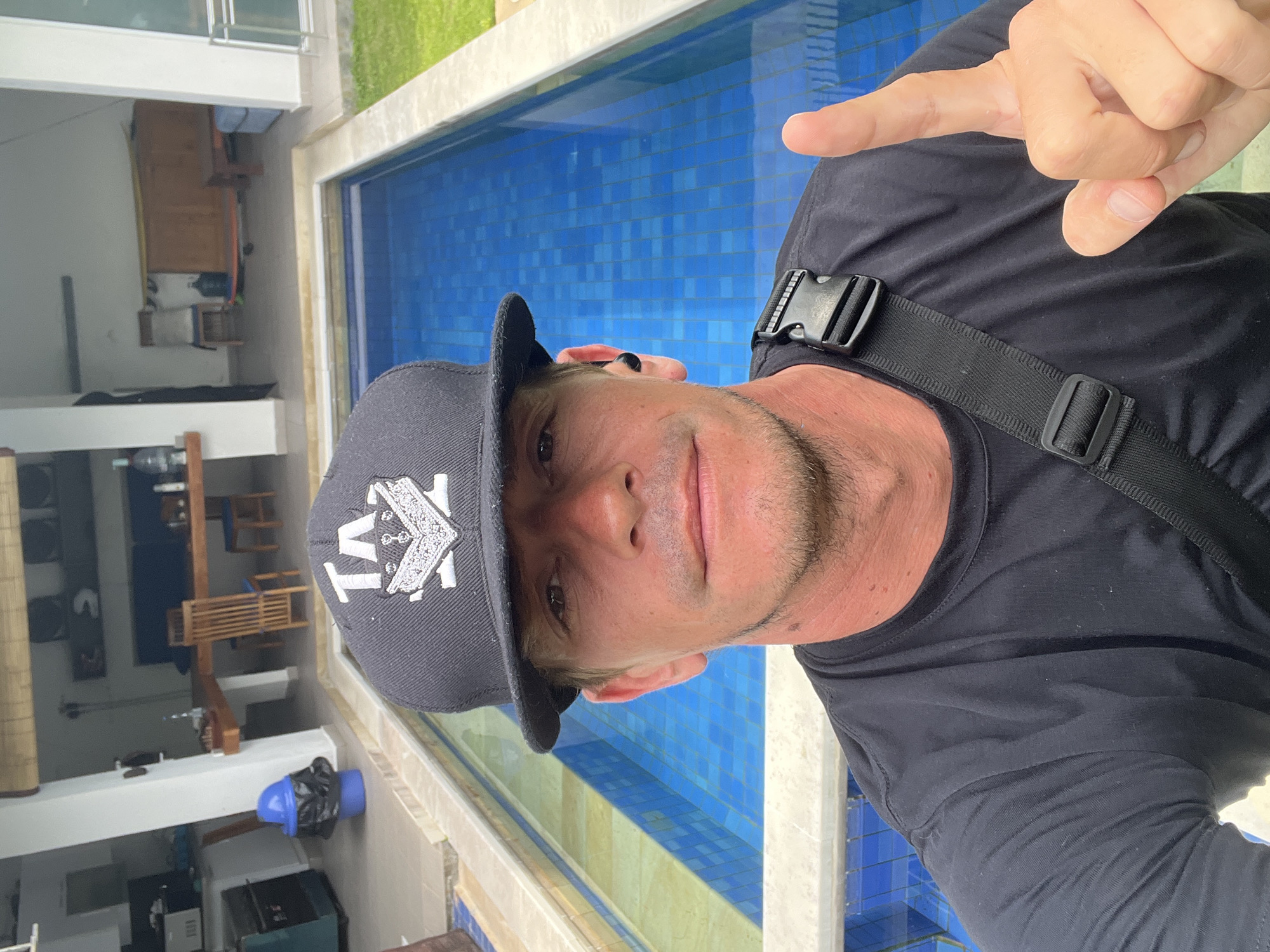 Man takes selfie outdoors in Pecatu, Indonesia