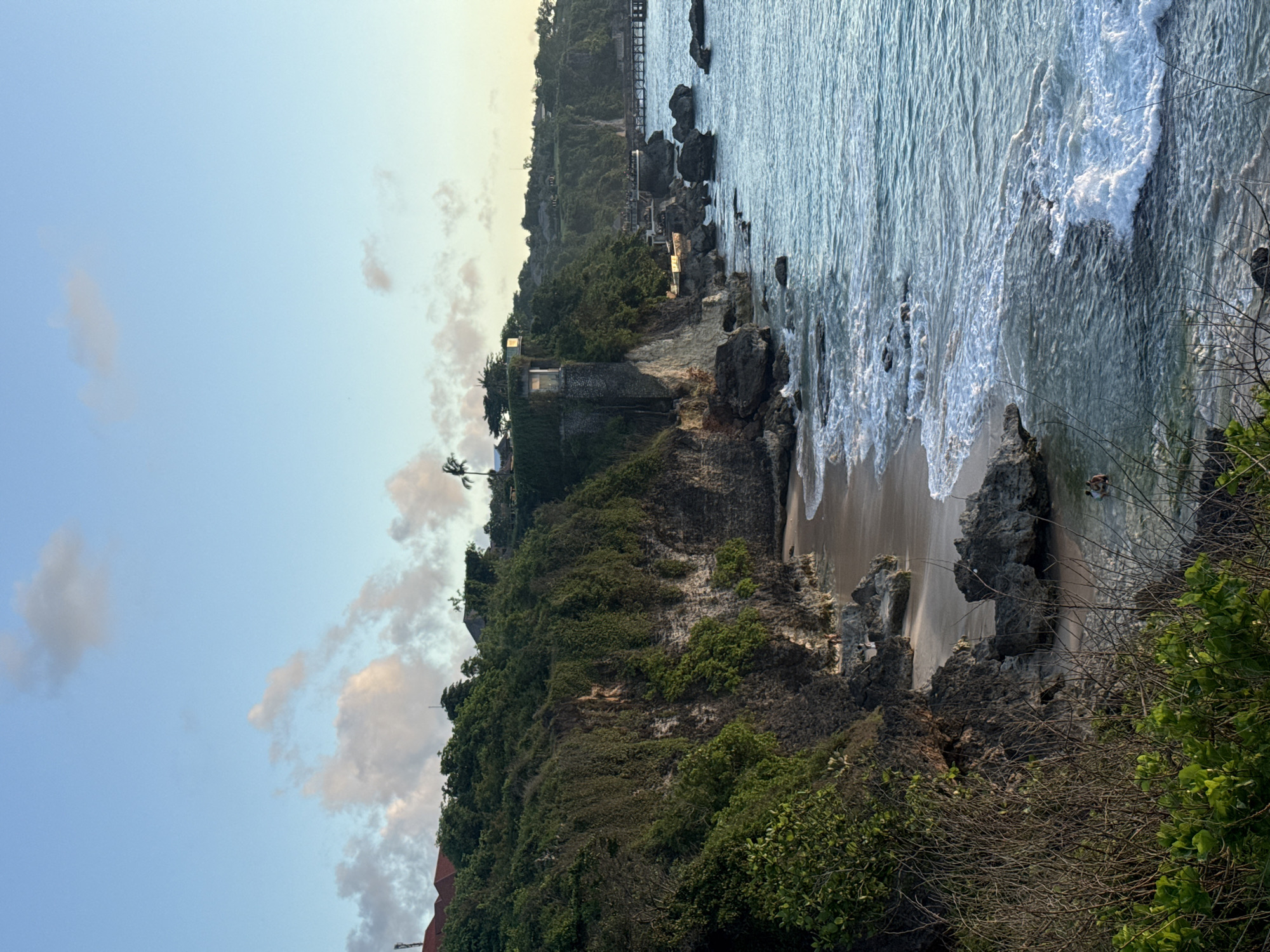 Coastal landscape with cliffs and beach documented in Indonesia