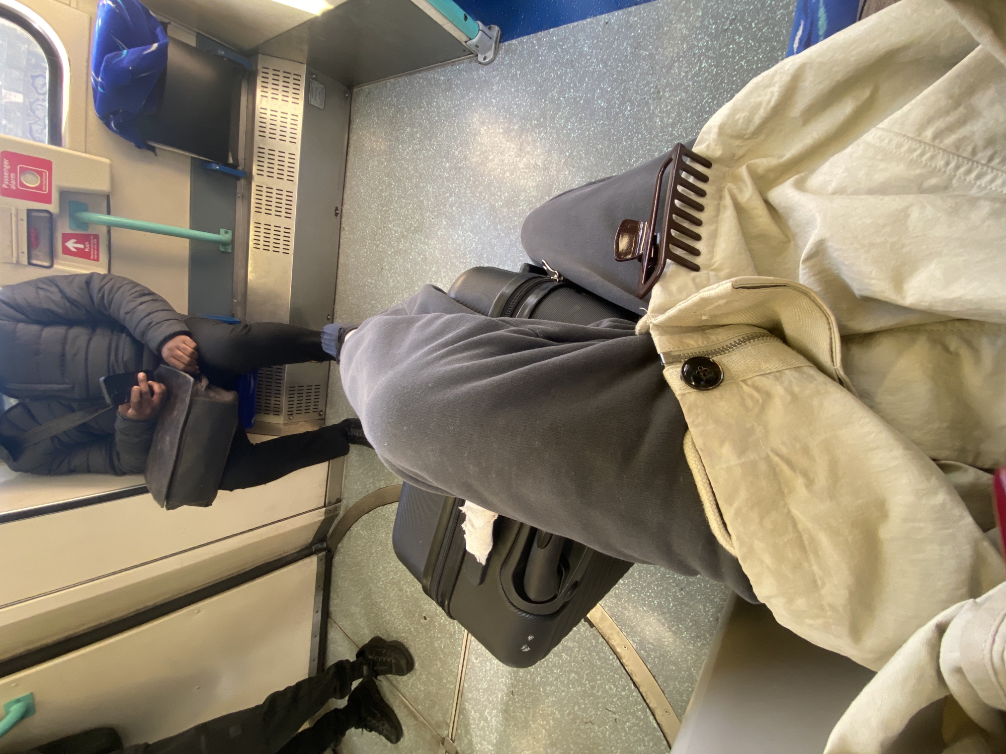 Commuter documents DLR journey across London platforms and carriages