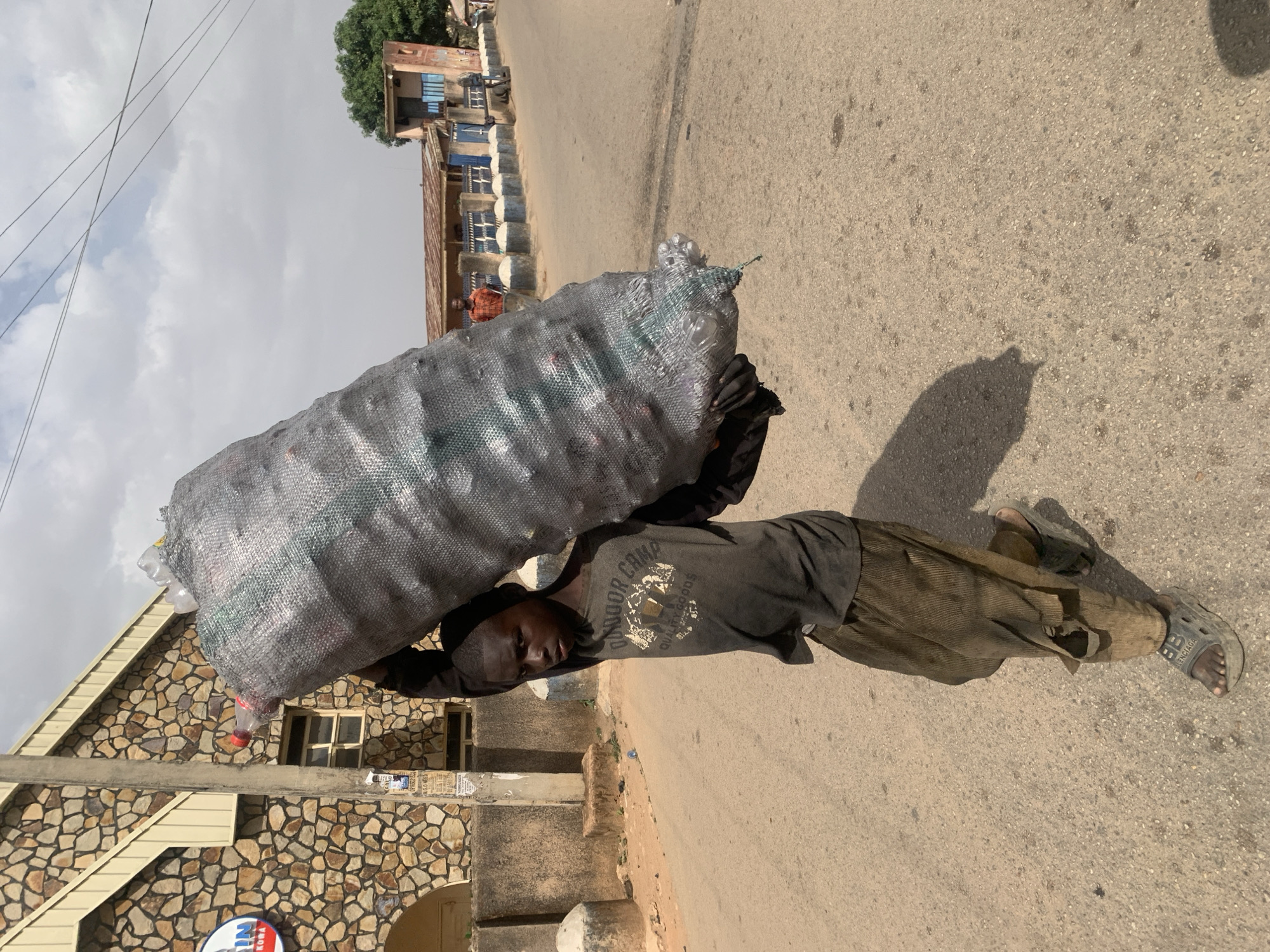 Daily street life documented across Jos, Nigeria neighborhoods