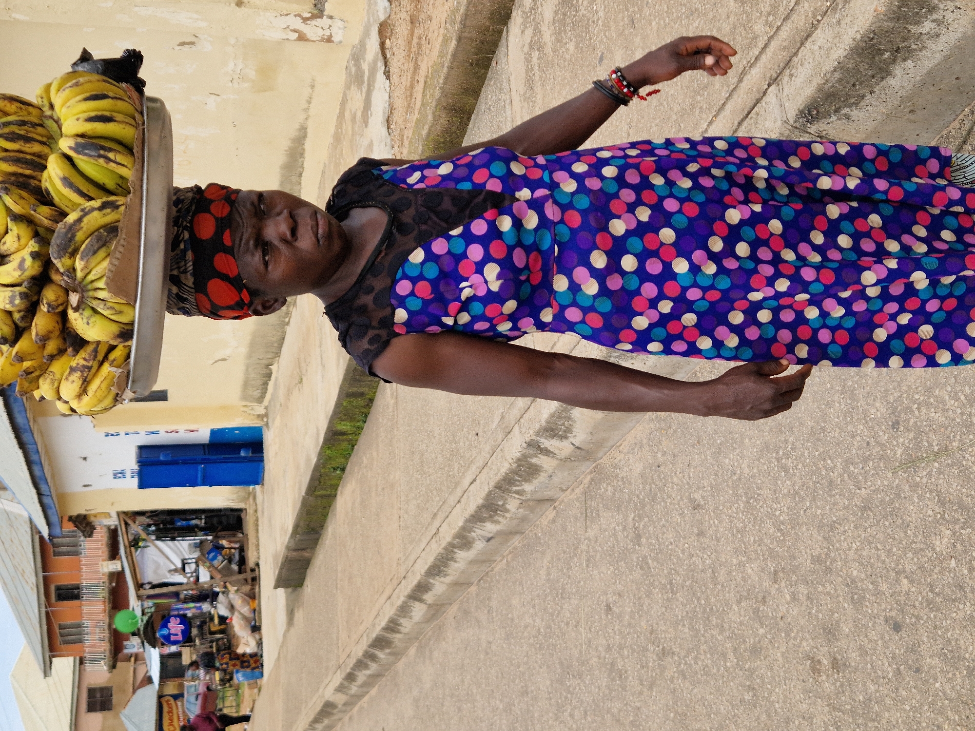 Graduation day and street life in a West African urban neighborhood