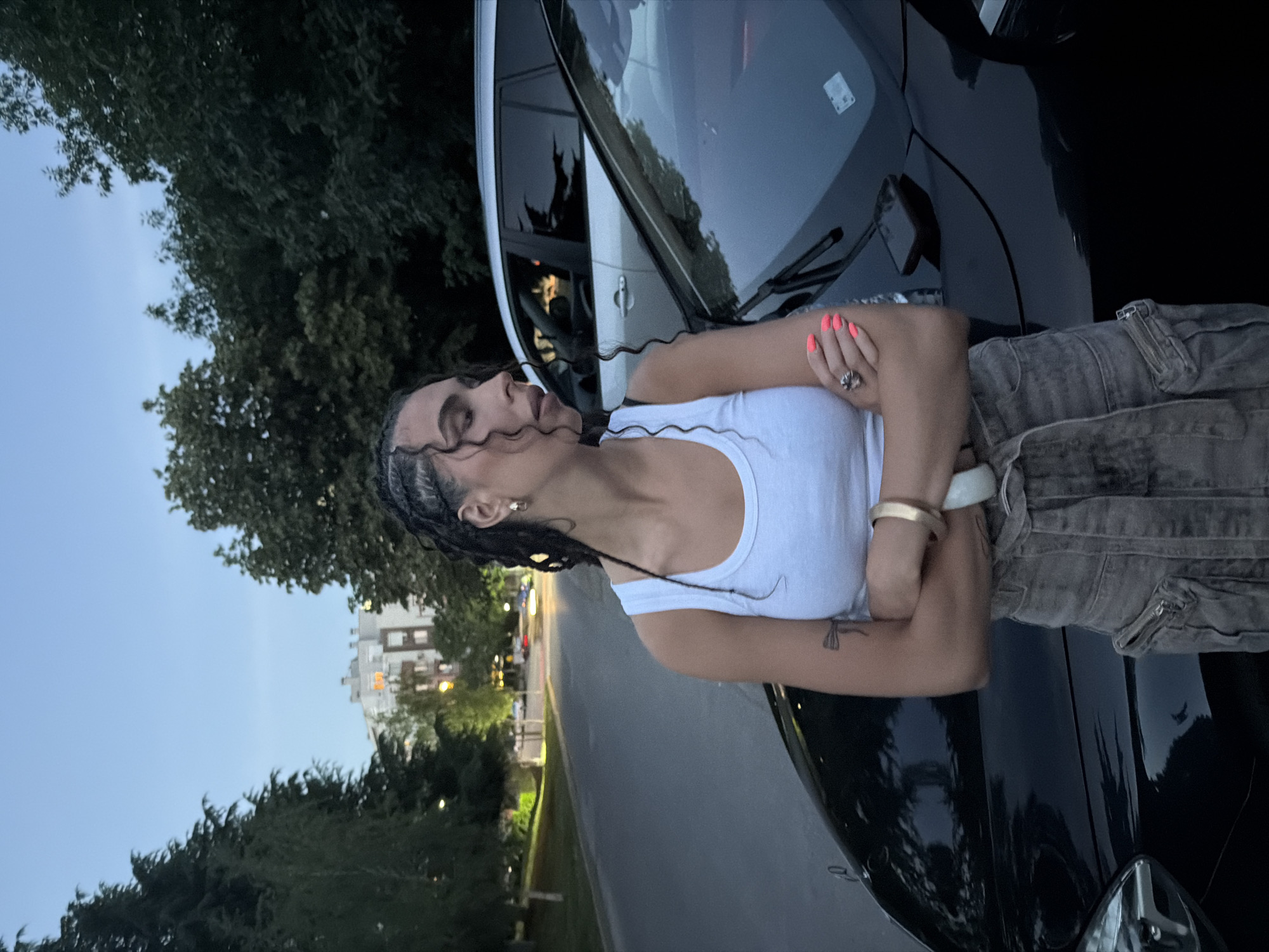Evening hangout by parked cars in Blagoevgrad, Bulgaria
