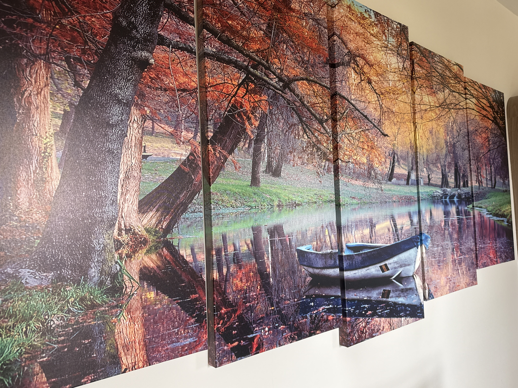 Canvas waterscape artwork displayed on wall in Bulgarian home