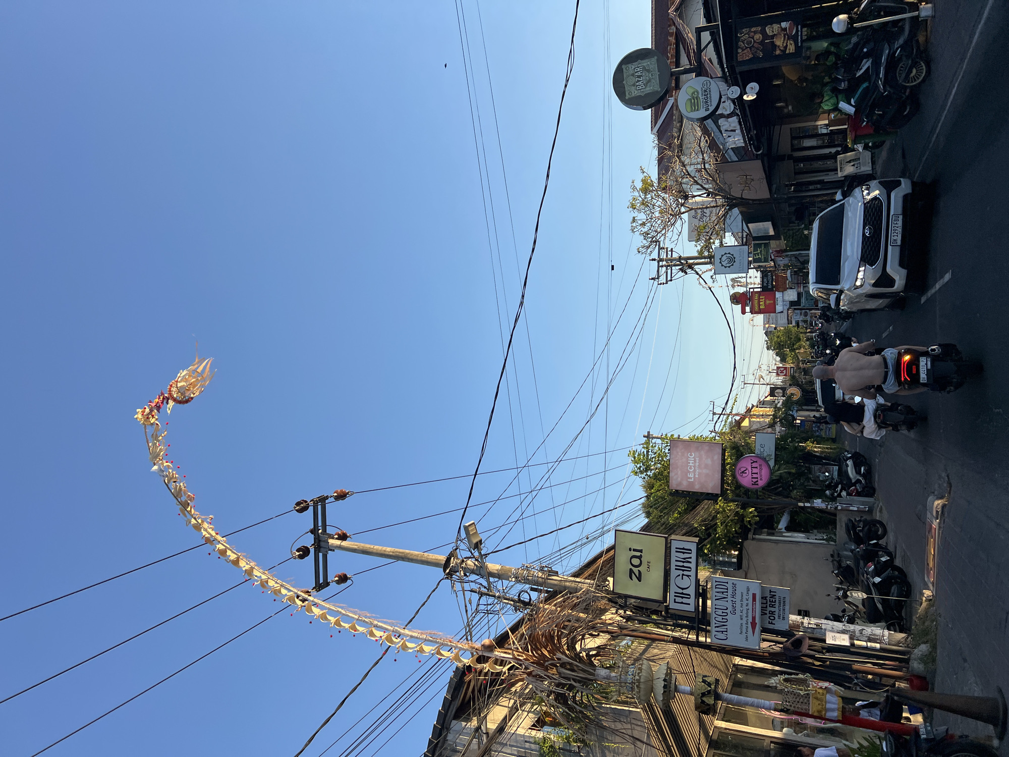Penjors line a North Kuta street during Balinese ceremony
