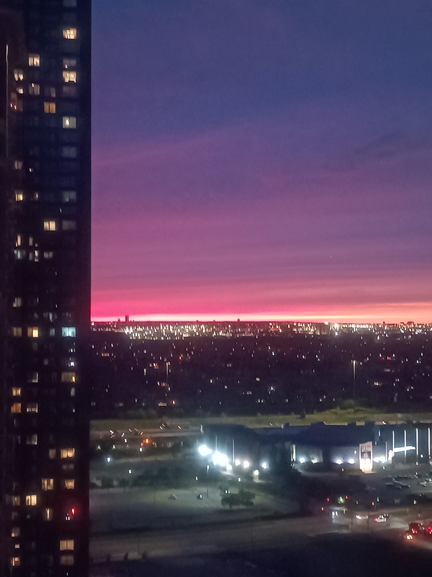 Mississauga twilight skyline paired with cozy indoor odds and ends
